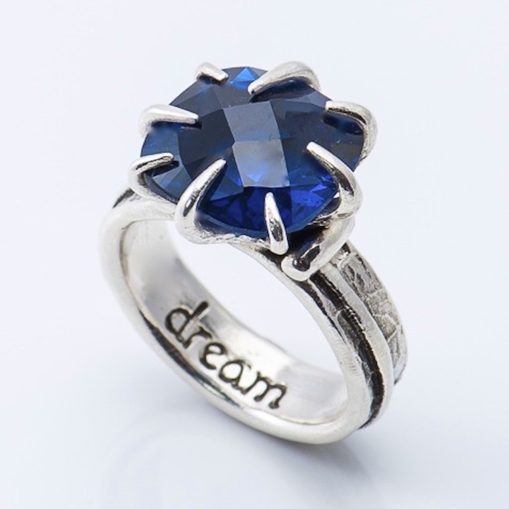 sapphireprongringonwhite.jpg