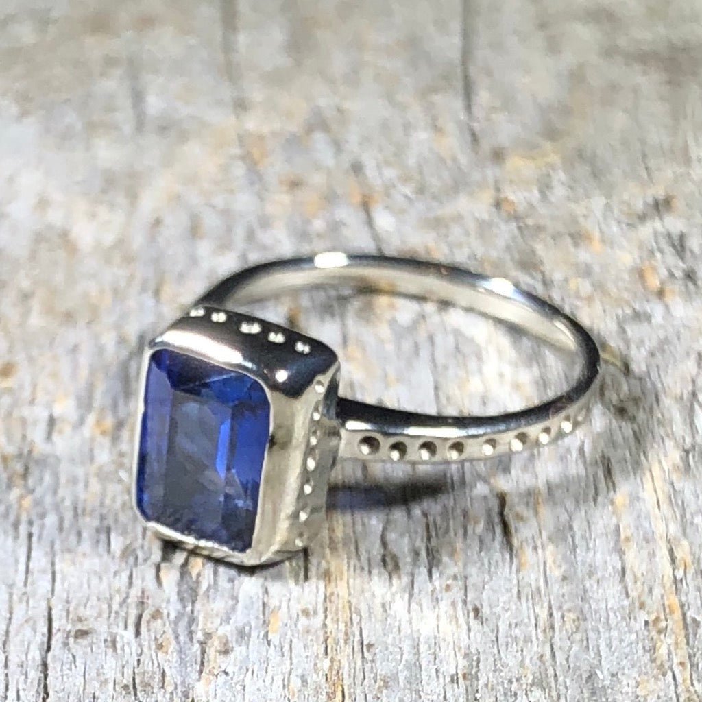 Emeraldcutsapphireringwhitegold_35bdd379-cdba-4ae0-97ef-bc9aee5925d8_1296x.jpg