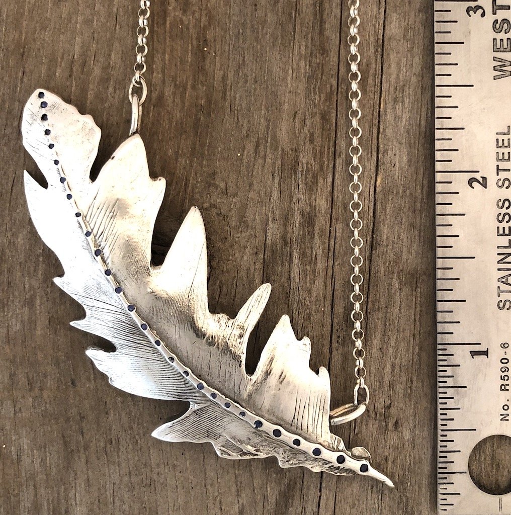 peregrinefeathersapphiresruler.jpg