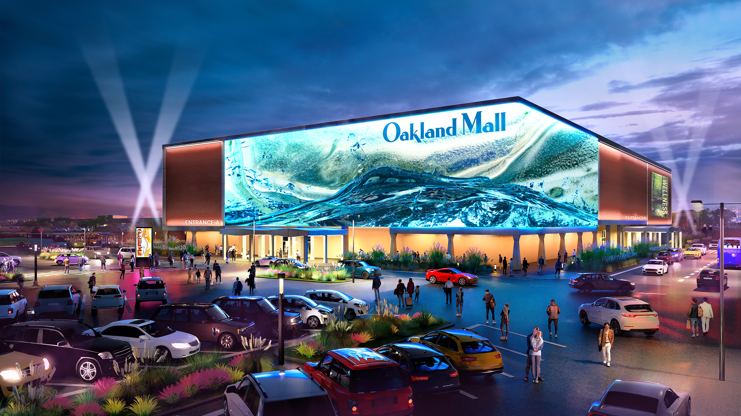 Nighttime exterior view of Oakland Mall in Michigan, illustrating site context and redevelopment conditions for a challenged retail destination