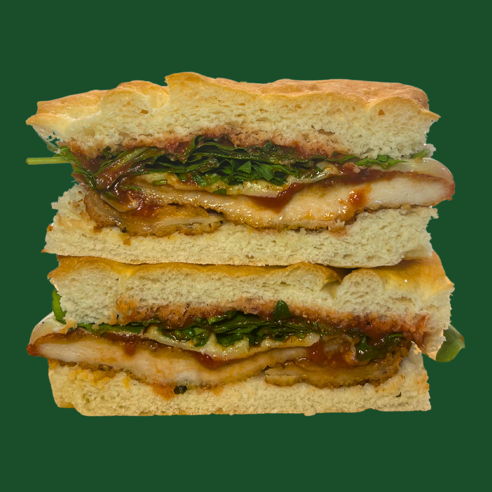 Parmarama - chicken schnitzel, ham, mozzarella, rocket, fresh basil & napoli sauce on fresh focaccia