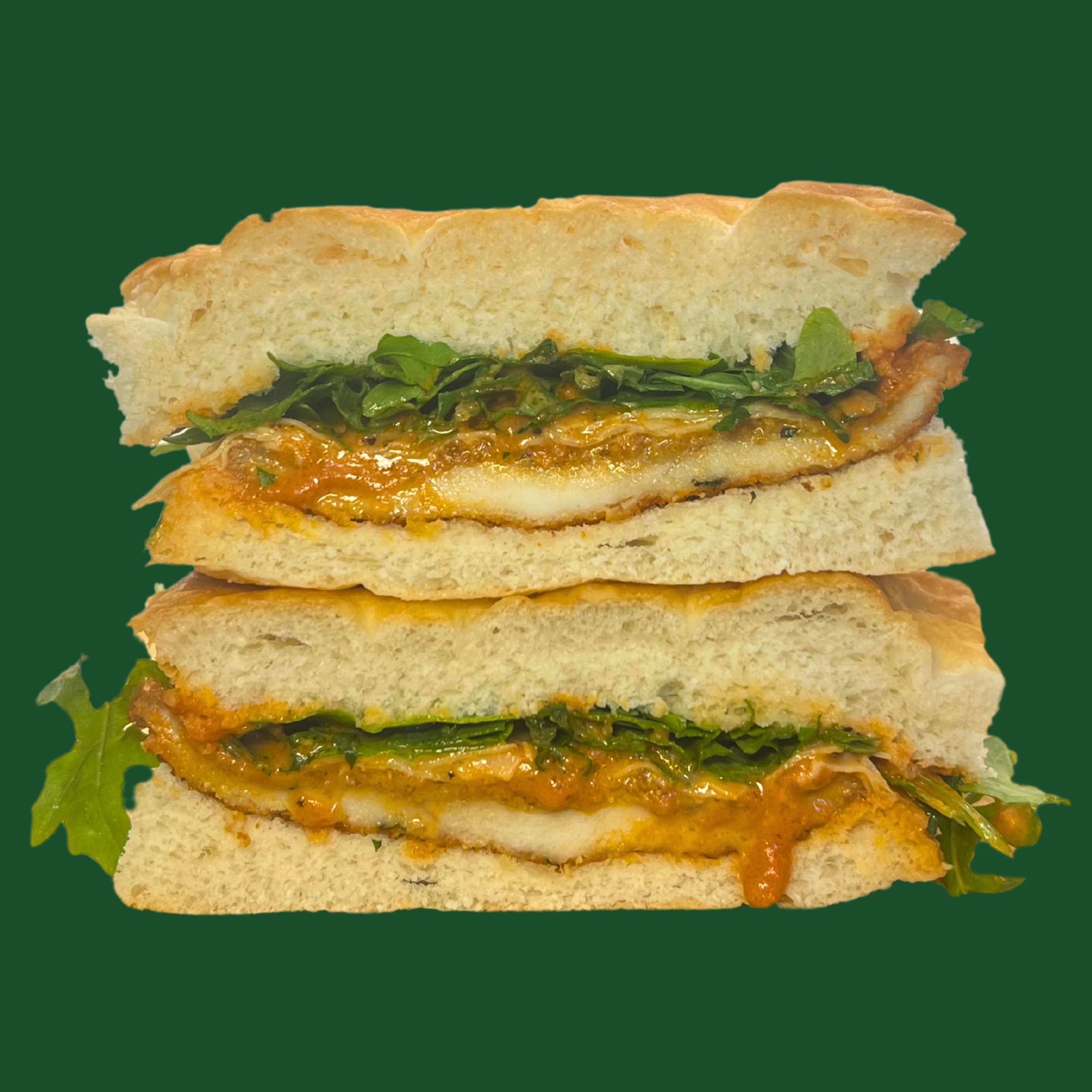 Schnitz & Giggles - chicken schnitzel, house made vodka sauce, provolone cheese, rocket & a splash of lemon juice on fresh focaccia