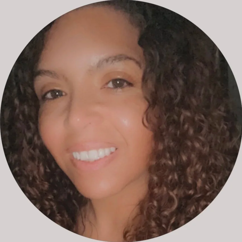 Smiling client showcasing beautiful volume lash extensions by Flaunt and Flutter Lashery in York PA