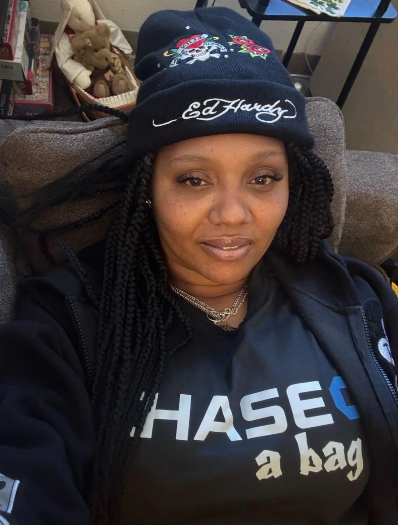 Happy client Diamond showing off her handcrafted custom lash extensions by Flaunt and Flutter Lashery in York PA