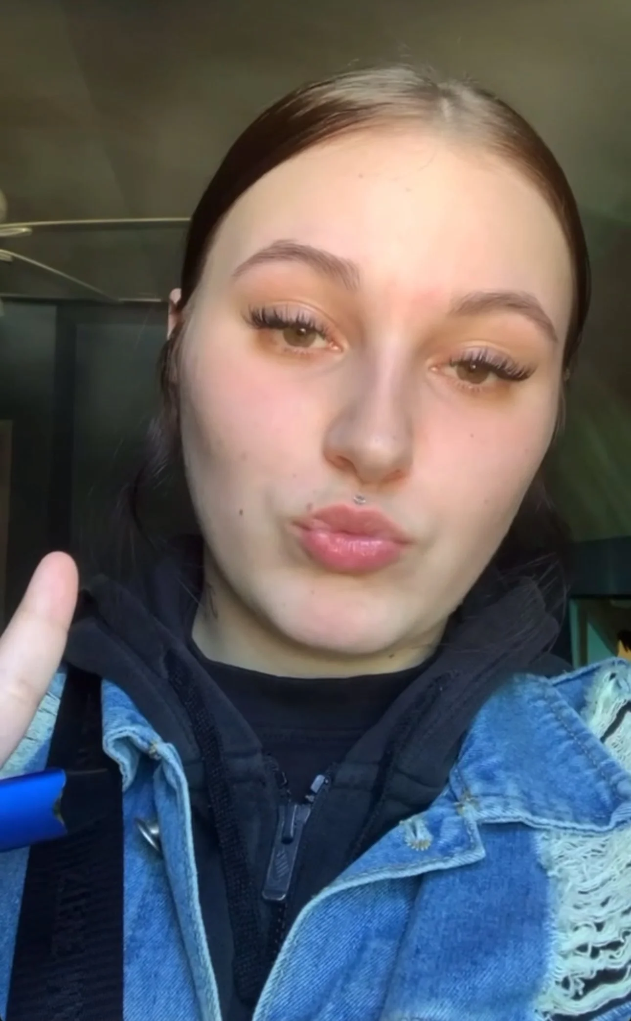 Happy client Chelsea showing off her flawless eyelash extensions by Flaunt and Flutter Lashery in York PA