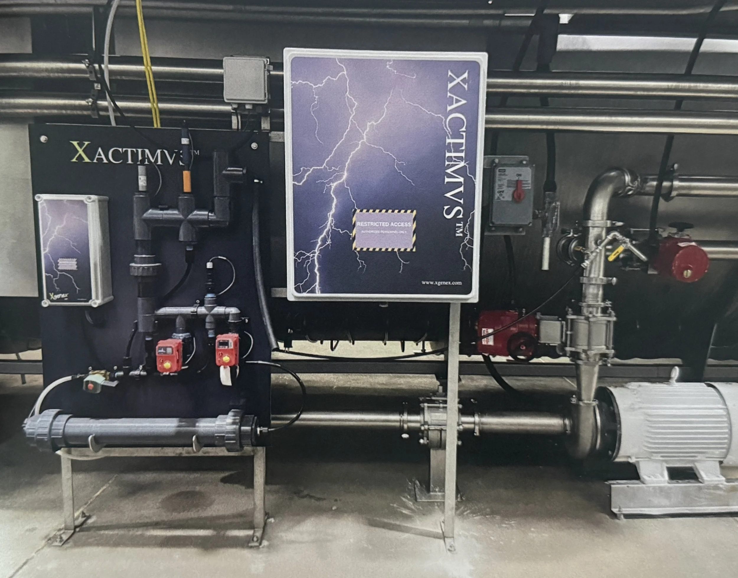 Xgenex Xactimus process-control equipment installed in a poultry processing facility.