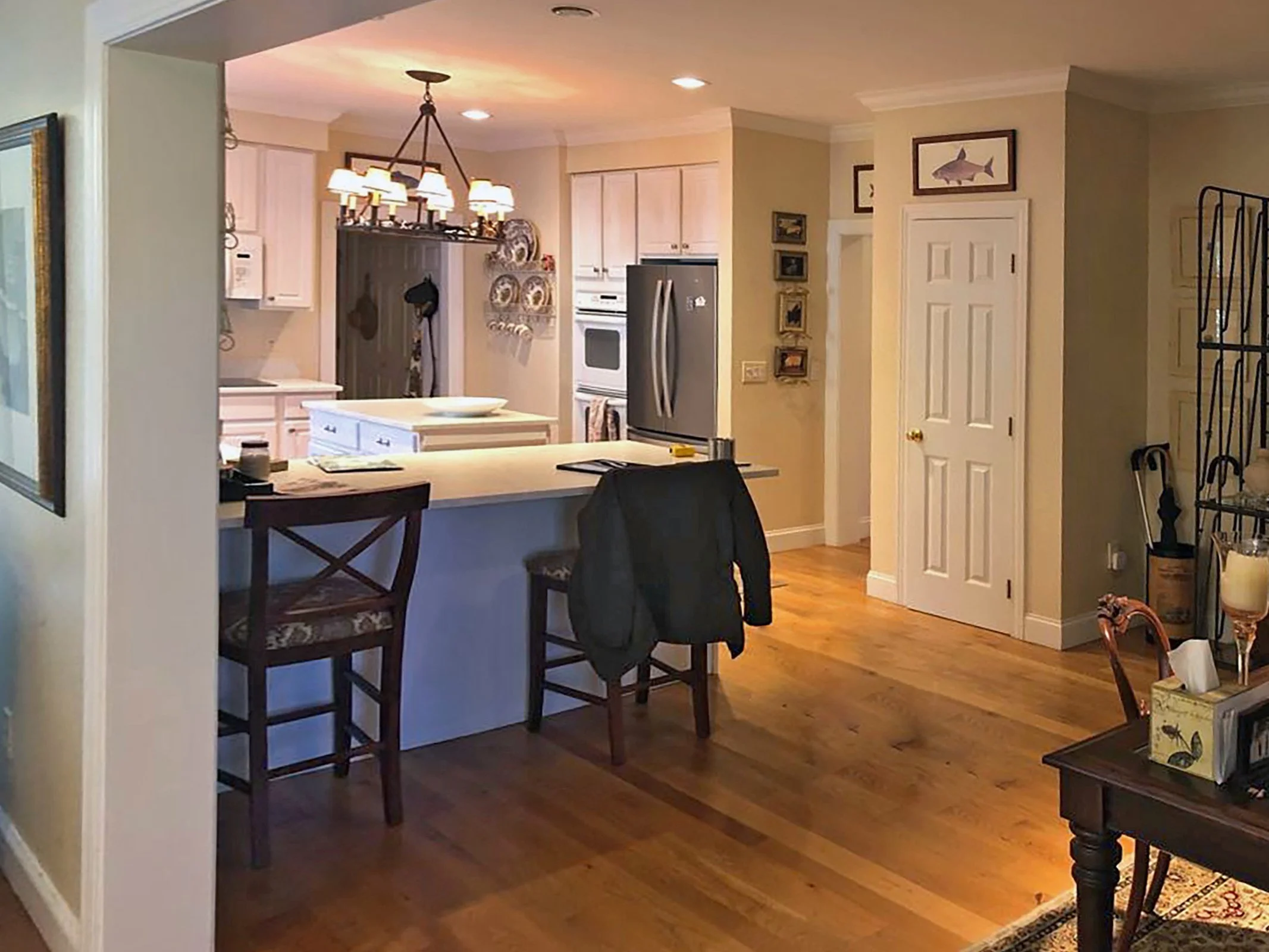 Before: The kitchen’s layout and finishes felt uninspired, lacking character and efficient use of space.