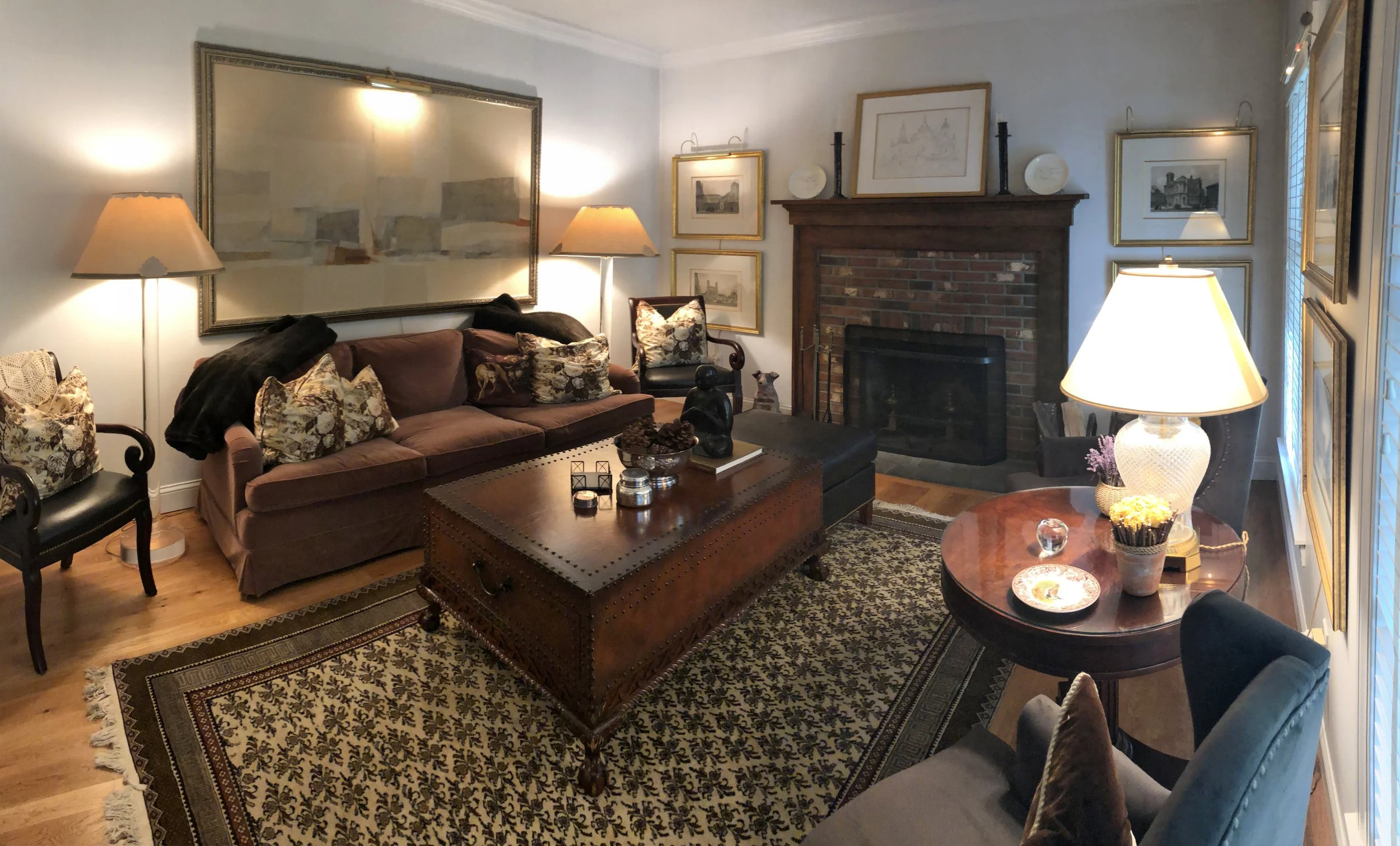 Before: The den felt dark and heavy, making the space seem smaller. Despite its central location, the fireplace was out of proportion and felt dated.​