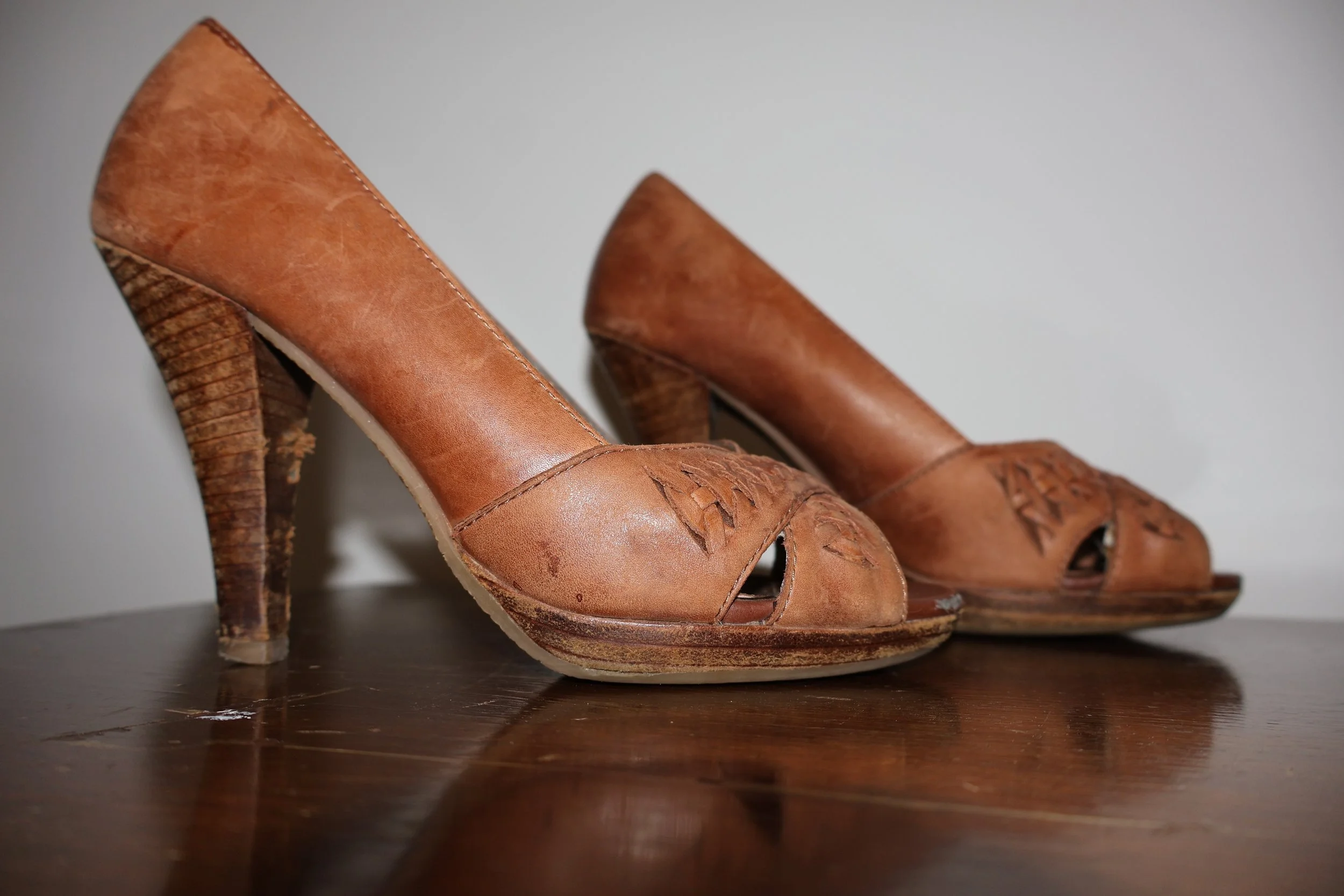 Open-toed leather and wooden heels