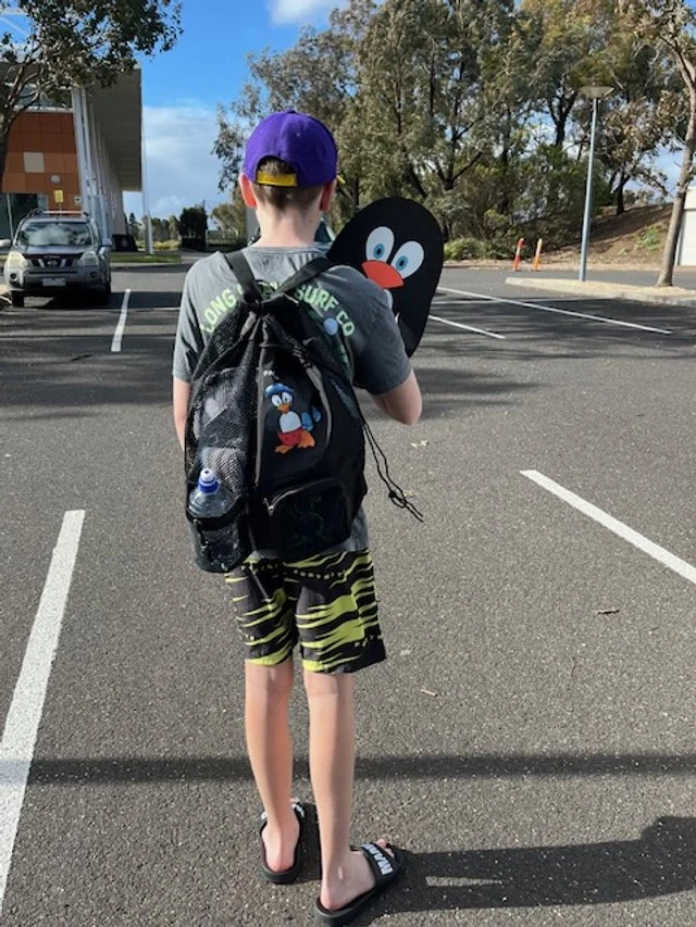 Ryan - swim bag and kickboard.jpg