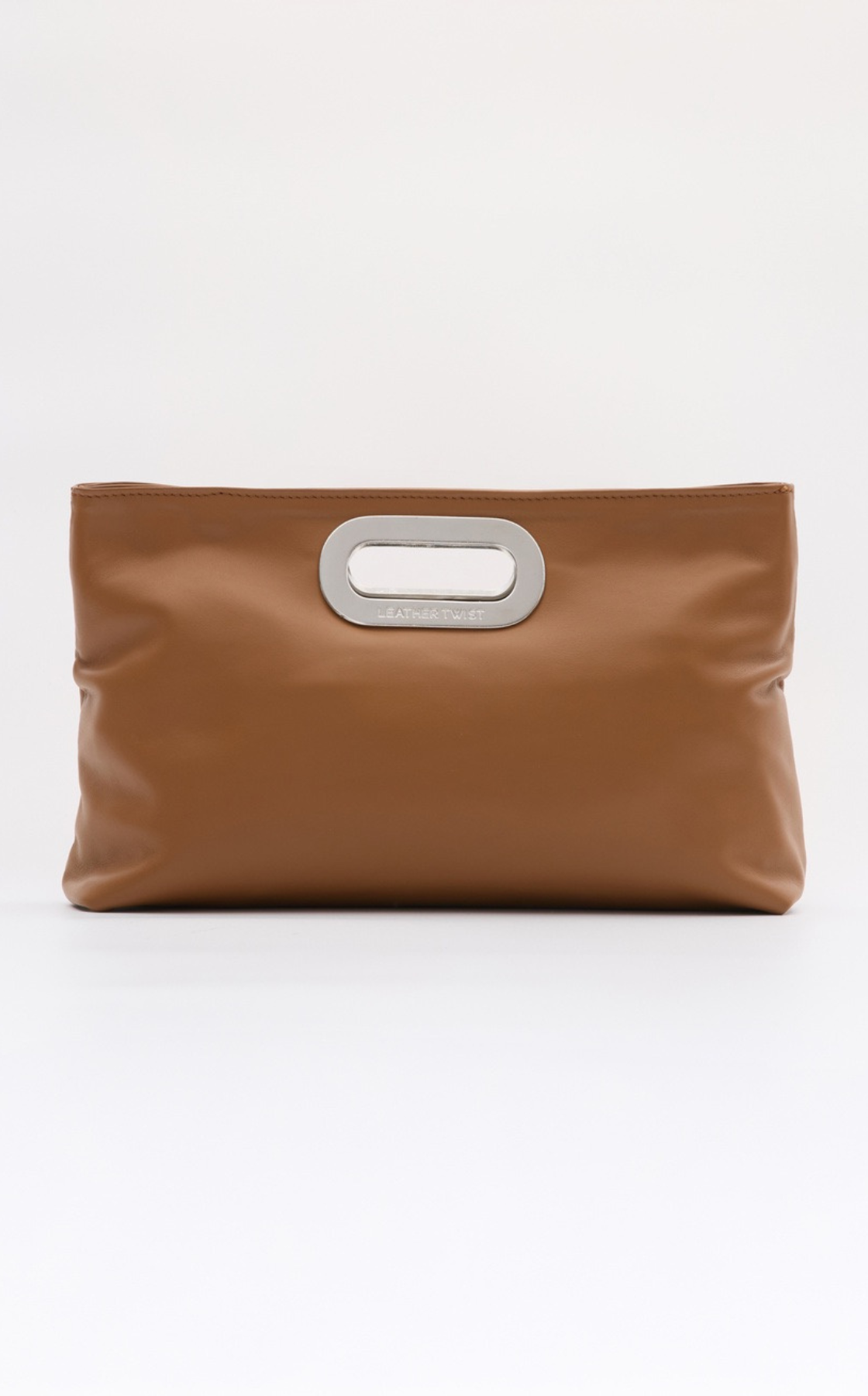 Brown leather clutch purse with a silver oval handle on a white background.