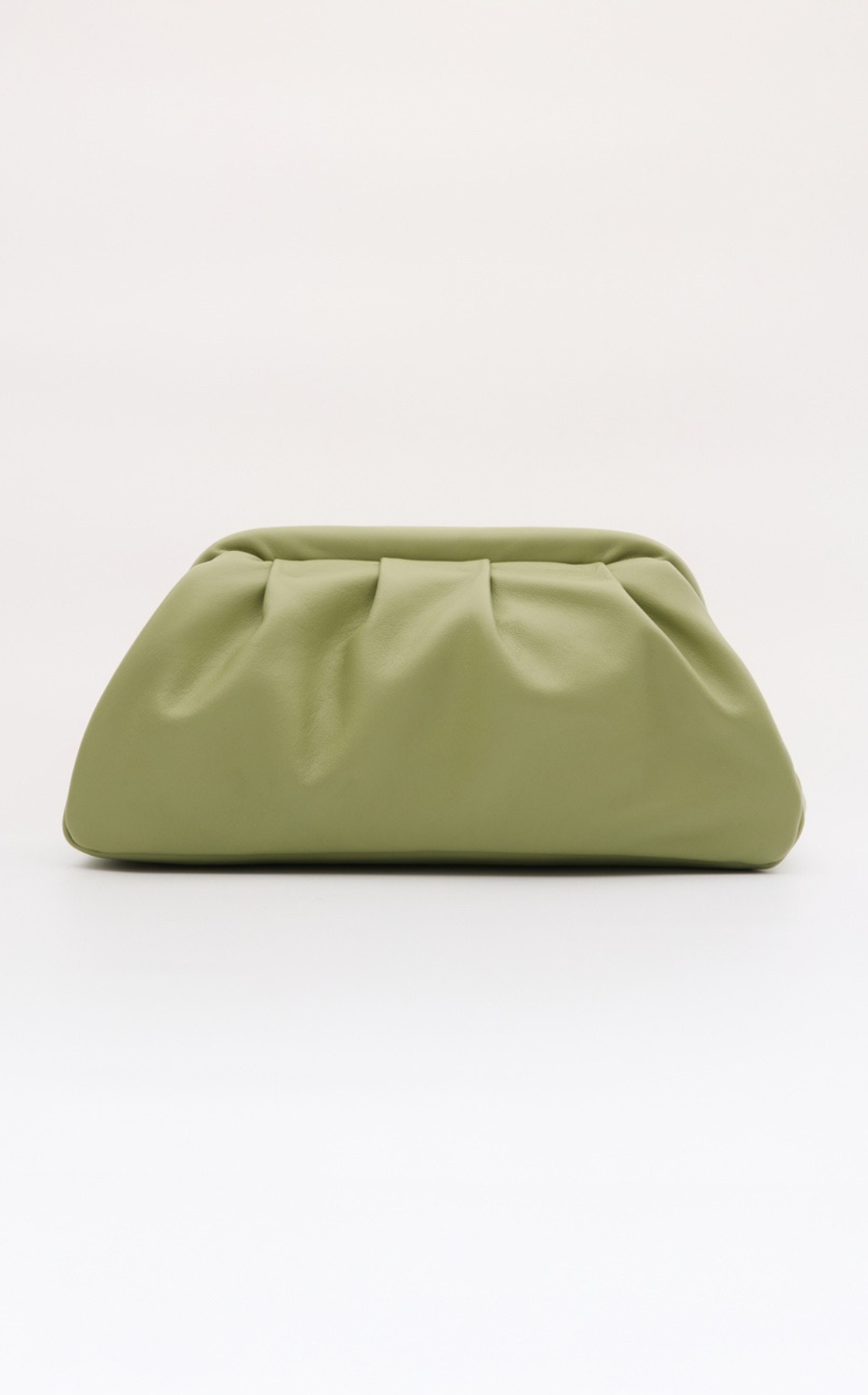Light green, gathered leather clutch purse on a plain white background.