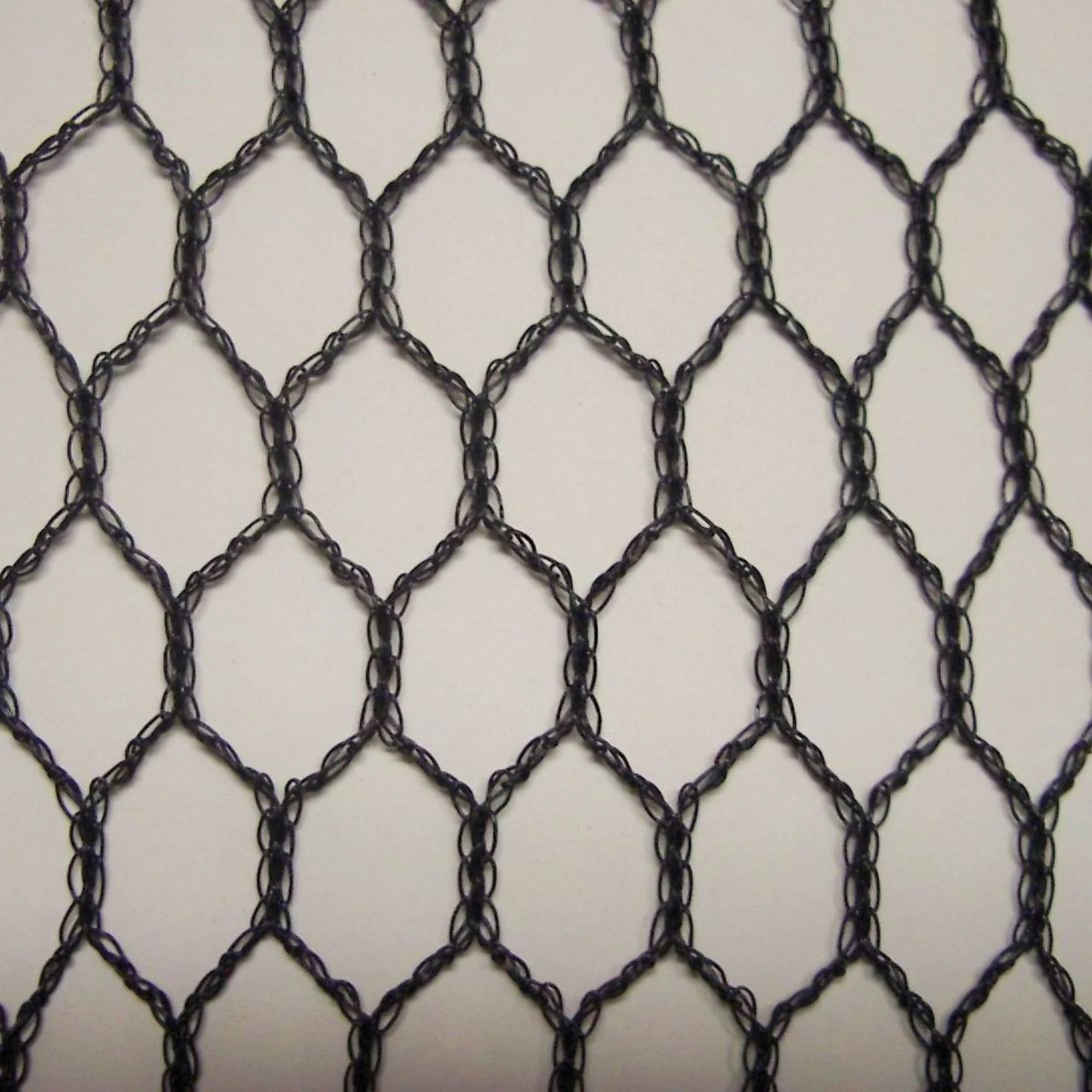 Hexamesh - Bird protection netting installed over vineyard rows for crop protection