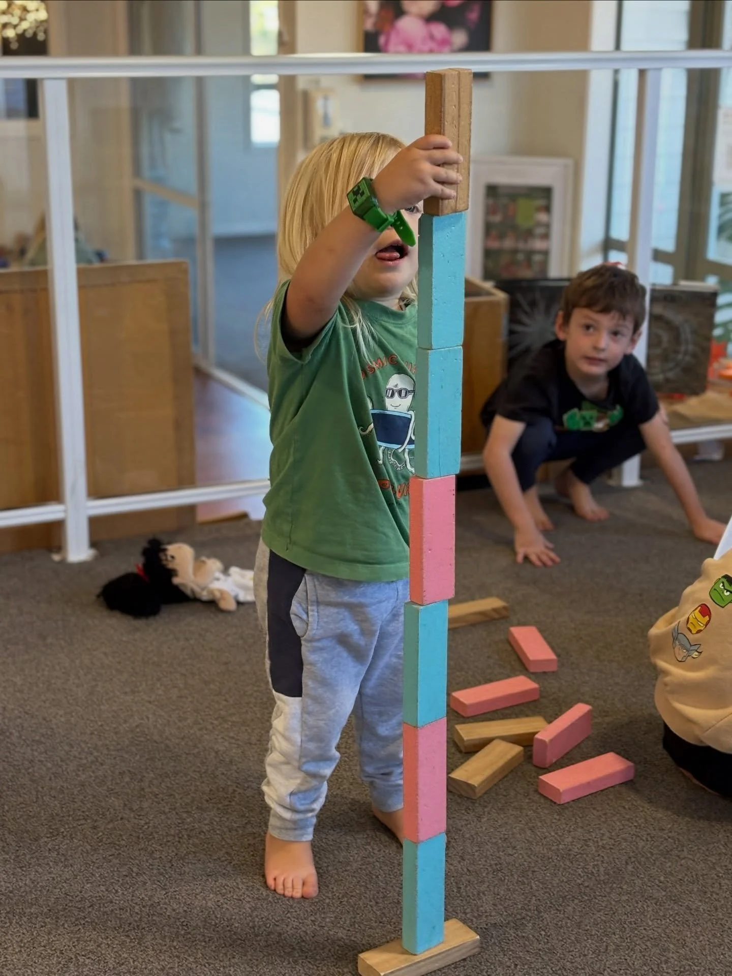 Building and construction is such a popular activity here at MBCC. This little builder was so excited to construct such a tall and balanced tower today using six blocks on a base. Unfortunately block number seven was just one too many and it tumbled 