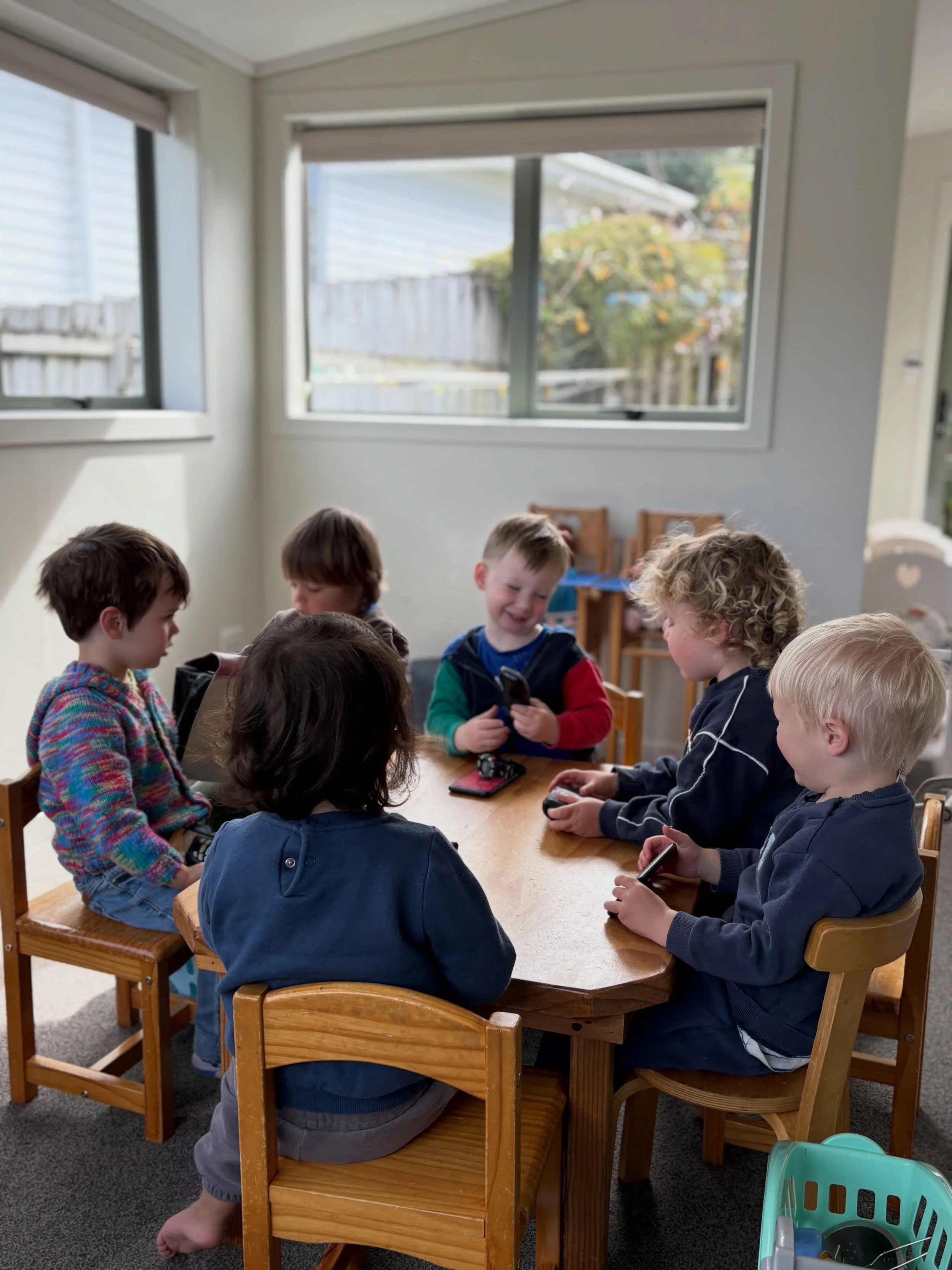 An important meeting took place in the MBCC family room this morning with a group of business men, each carrying their cellphones. There was a lot of enthusiastic discussion and even a bit of singing that took place during the meeting and these littl