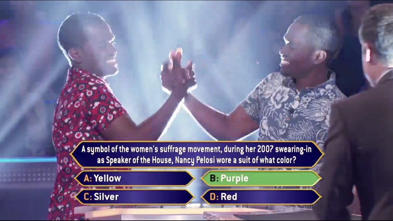 Hannibal and Malcolm Brooks as they compete and cheer each other on while on the game show, "Who Wants To Be a Millionaire".