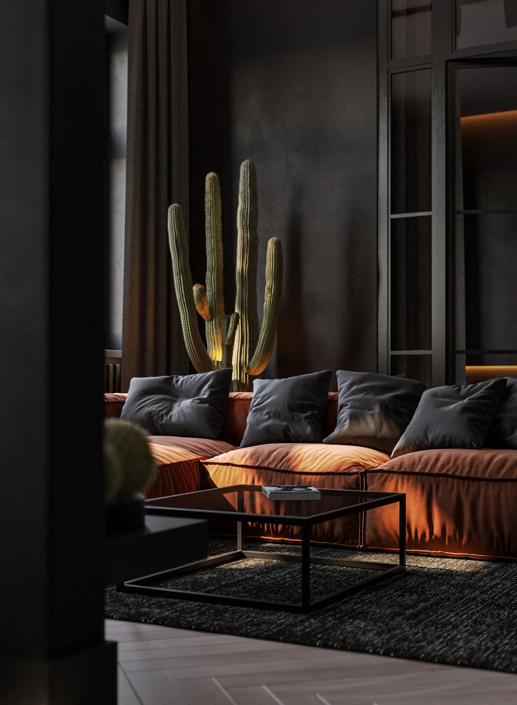 A living room corner with a dark wall, a tall cactus, a burnt orange sofa with black cushions, a black coffee table, and a dark cabinet with shelves.
