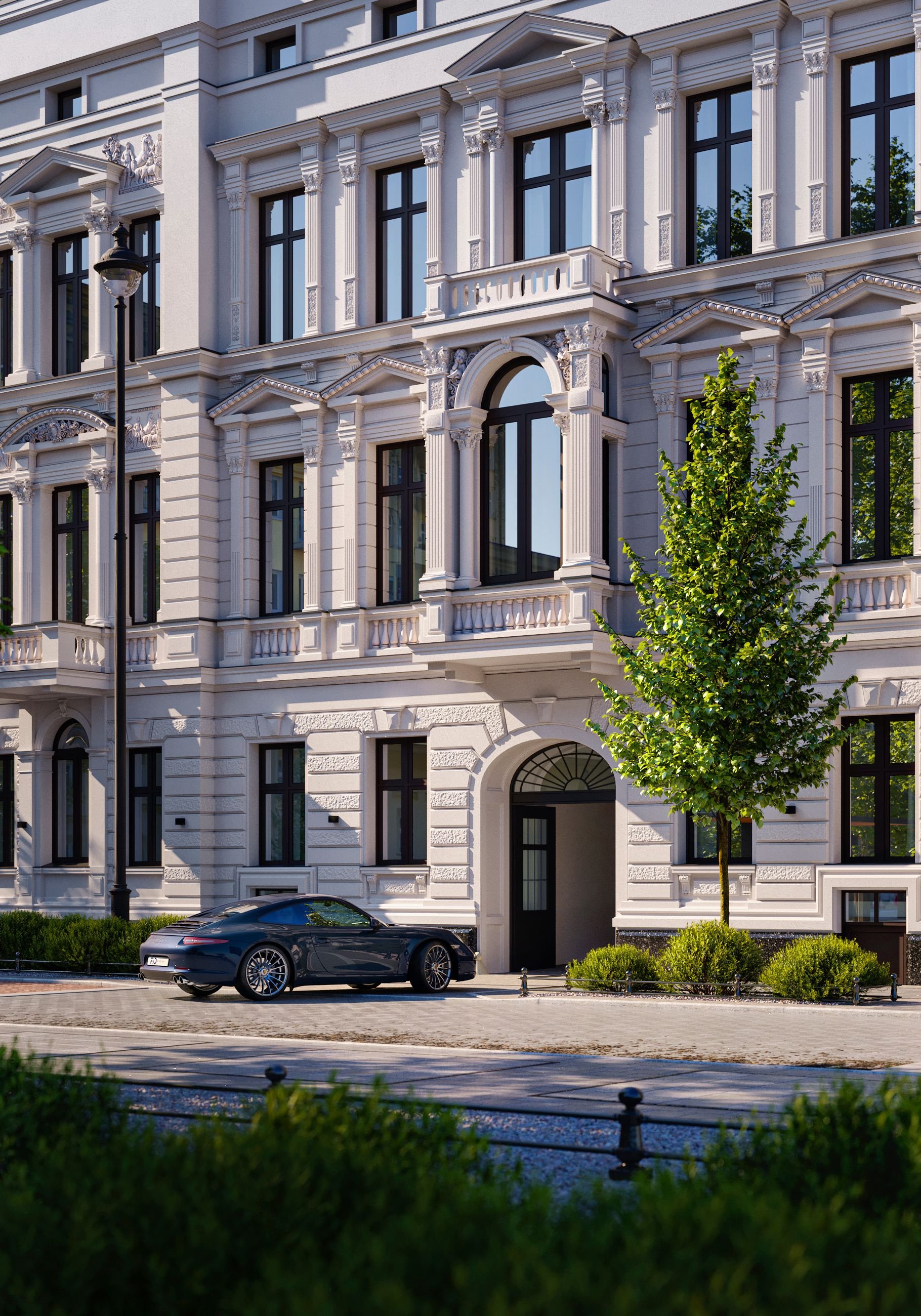 Luxury white multi-story building with ornate architectural details, black-framed windows, a tree in front, a black sports car parked on the street, a streetlamp, and landscaped greenery. Kamil Rombczyk portfolio architectural vizualization. Kamil Ro