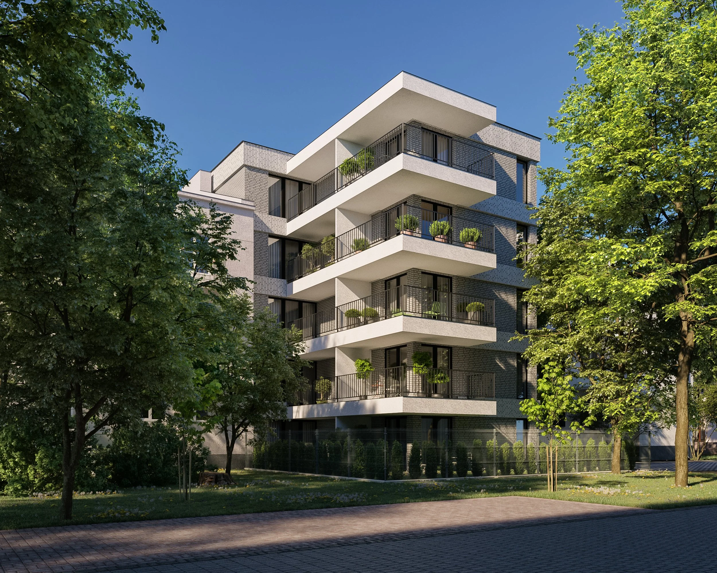 A modern multi-story apartment building with multiple balconies, surrounded by green trees and a sidewalk, under a clear blue sky.  Kamil Rombczyk portfolio architectural vizualization. Kamil Rombczyk portfolio wizualizacje architektoniczne. Wizualiz