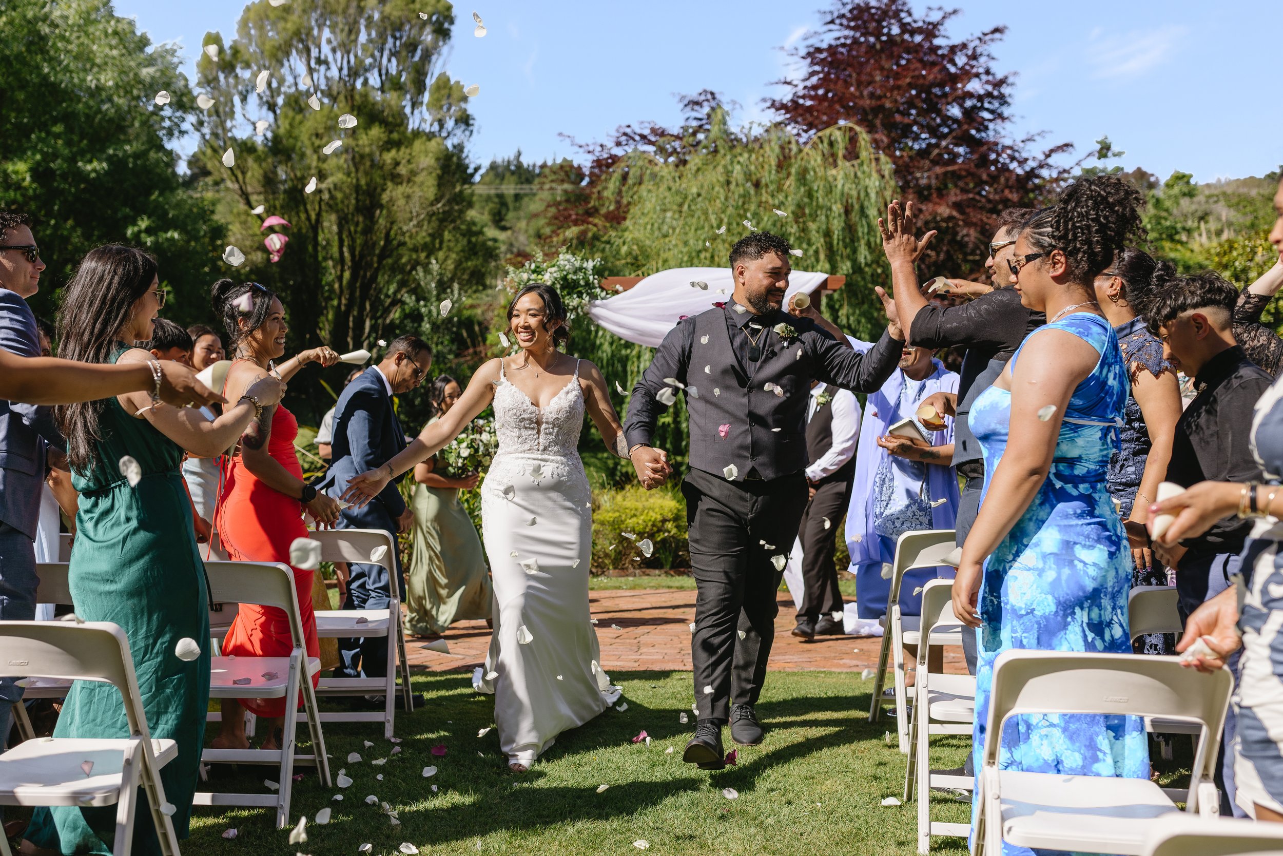Wedding ceremony with little girl out front
