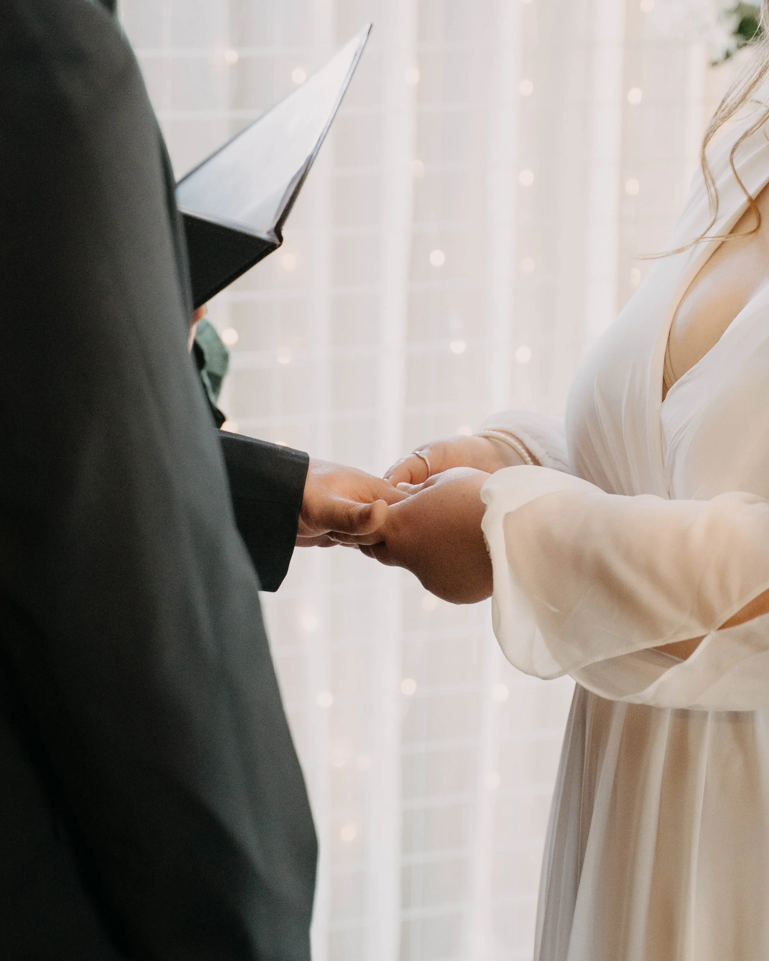 couple doing wedding ring exchange