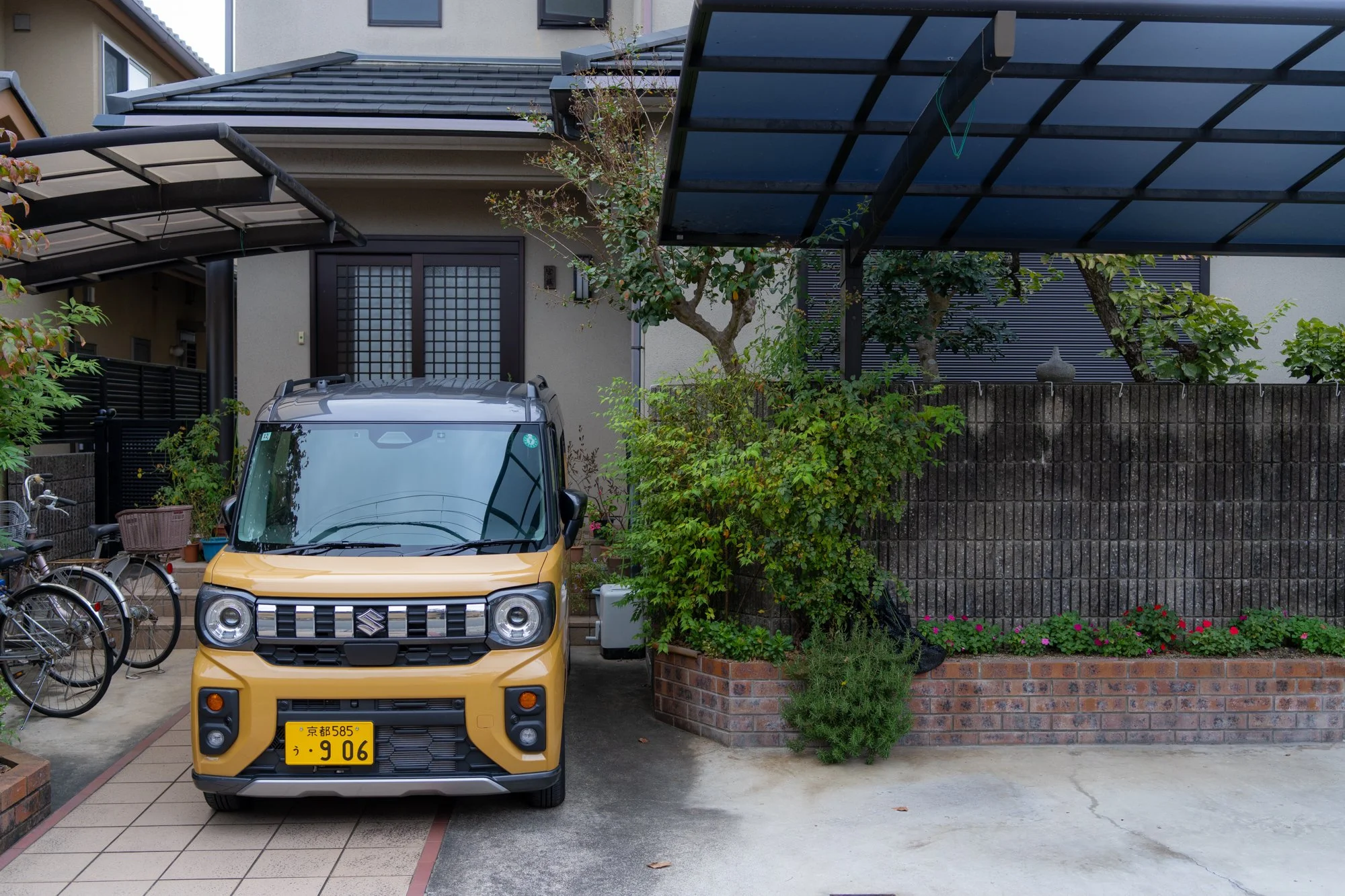 Harmony & Grace Kyoto small house small yellow car.jpg
