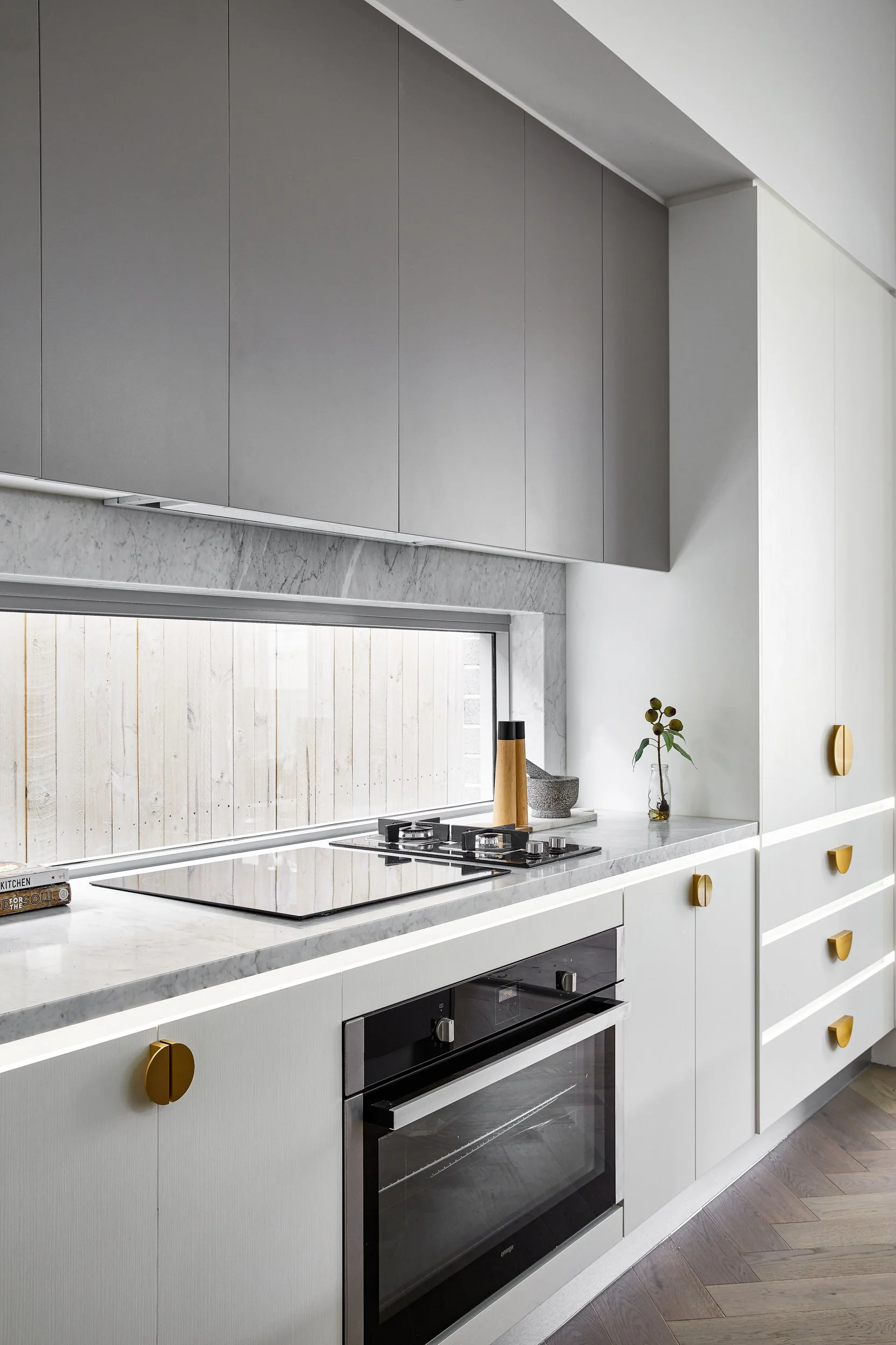 Modern Pilates studio with reformer machines and a mirrored wall