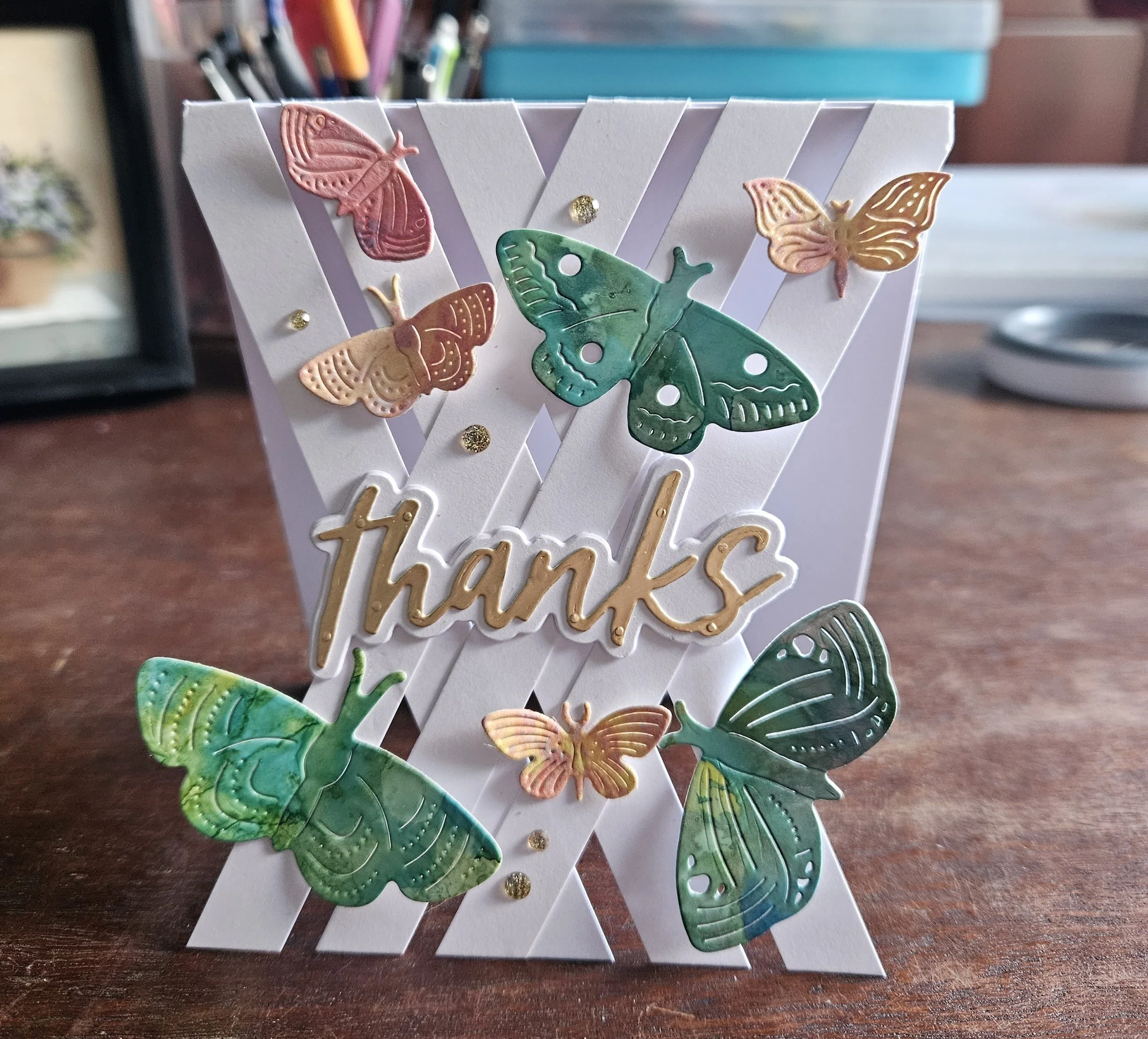 GS-Thanks0005-die-cutting-pink-and-green-butterflies-white-background-thanks.jpg