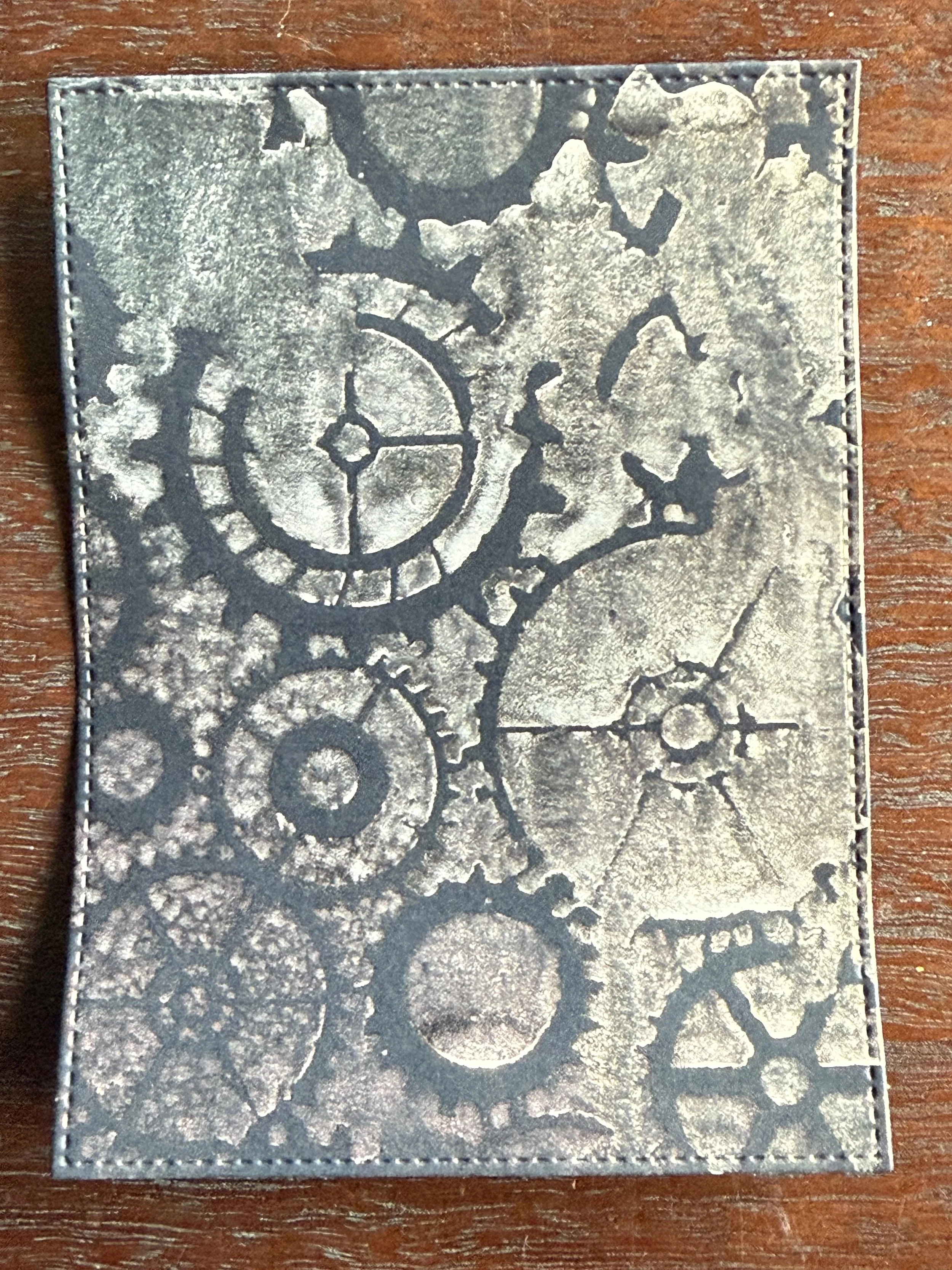  This panel was created by using a stencil (from my stash; not sure what brand) and spraying Simon Hurley Solar Spray in Overheated, Golden Hour, and Crocodile Tears. This technique doesn’t give you a perfect finish – it’s not meant to – but more of 