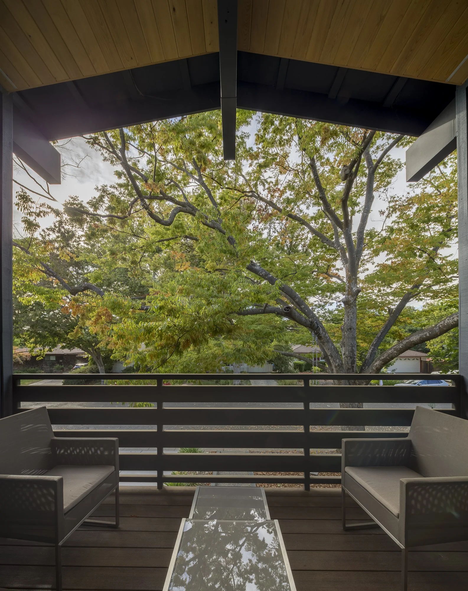 The cozy front deck is perfect for morning coffees and neighborly greetings, while its second-floor location allows for privacy and quiet.