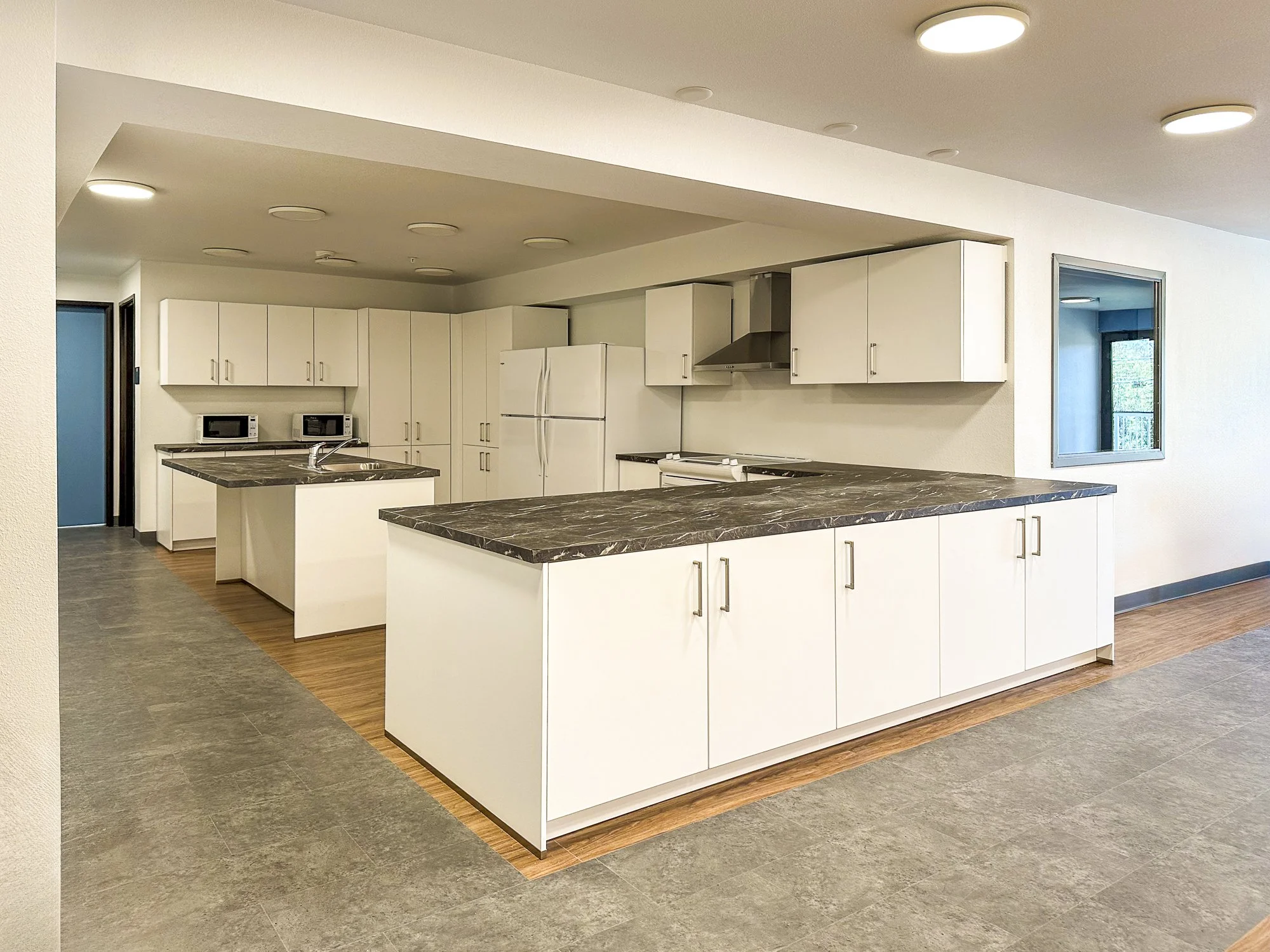 A shared kitchen provides a spot to connect, chat, and eat together.