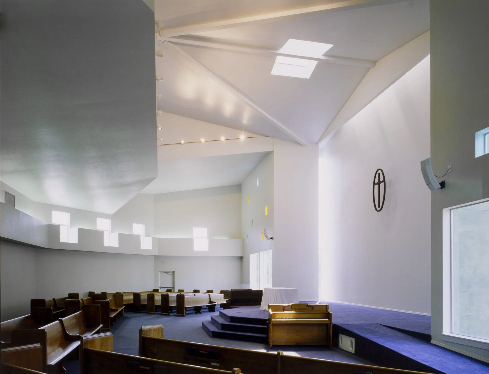 Daylight from strategically placed windows and skylights fills the new 250-seat sanctuary.