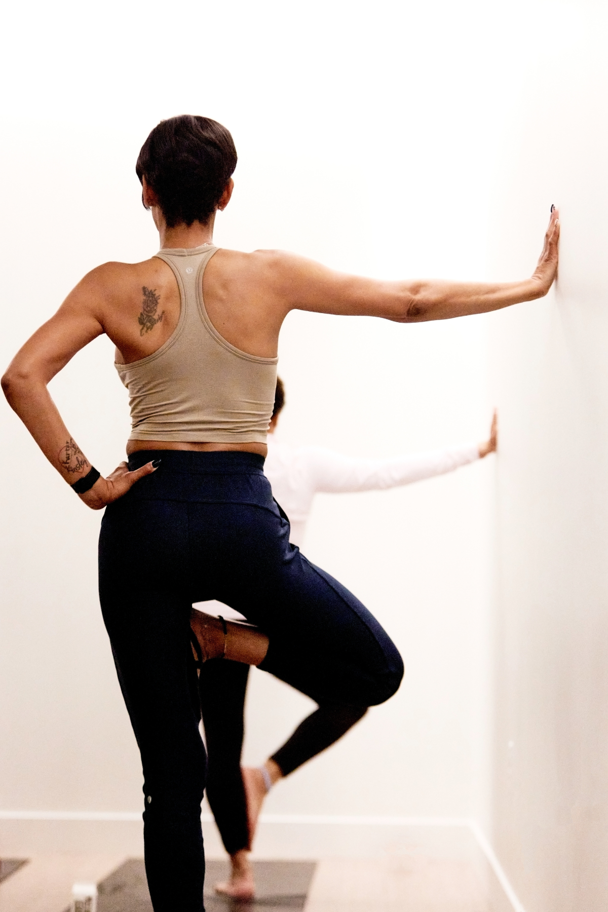 Woman doing yoga pose in Denver
