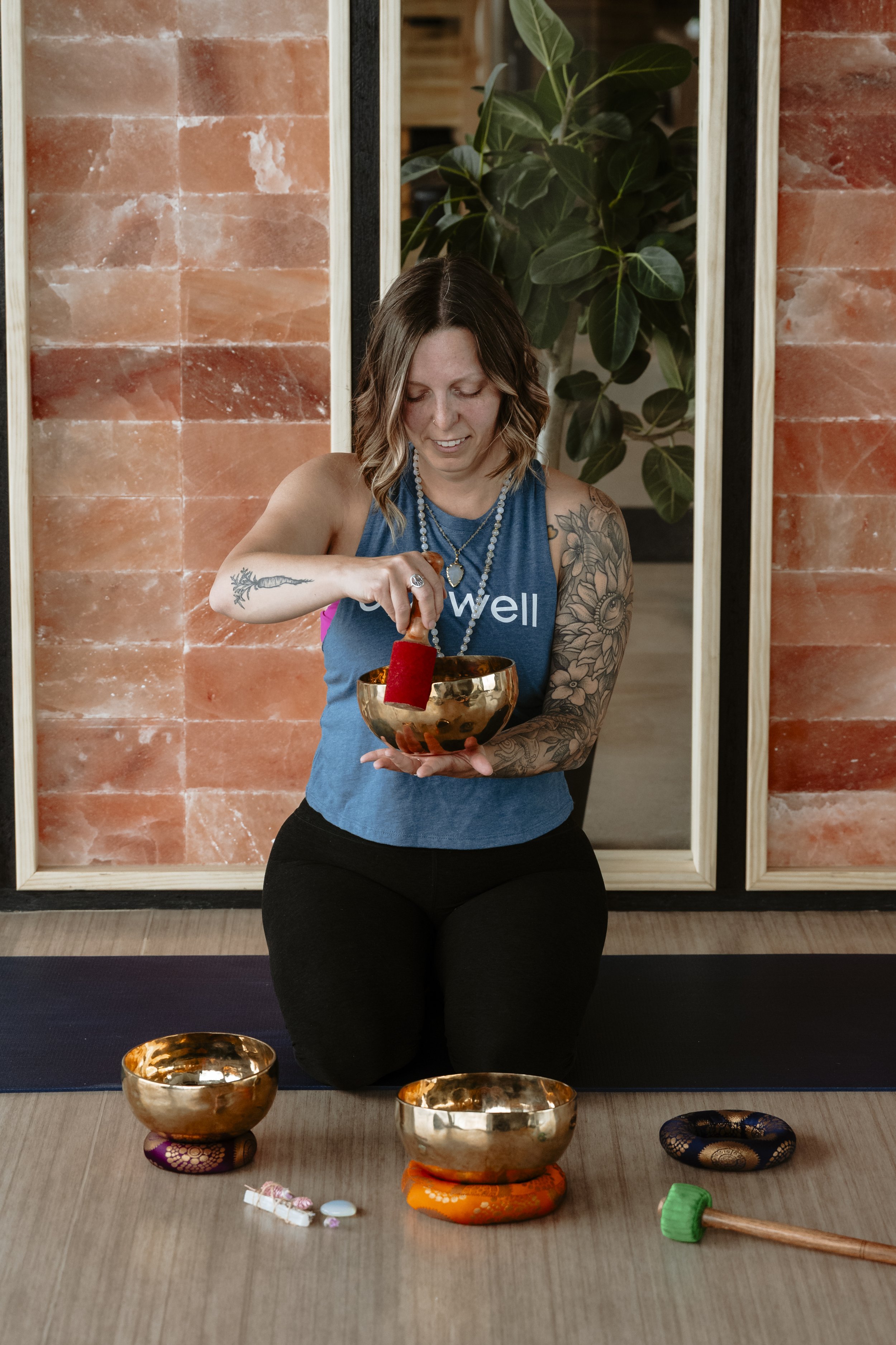 Yoga teacher with sound bowls in Denver, CO