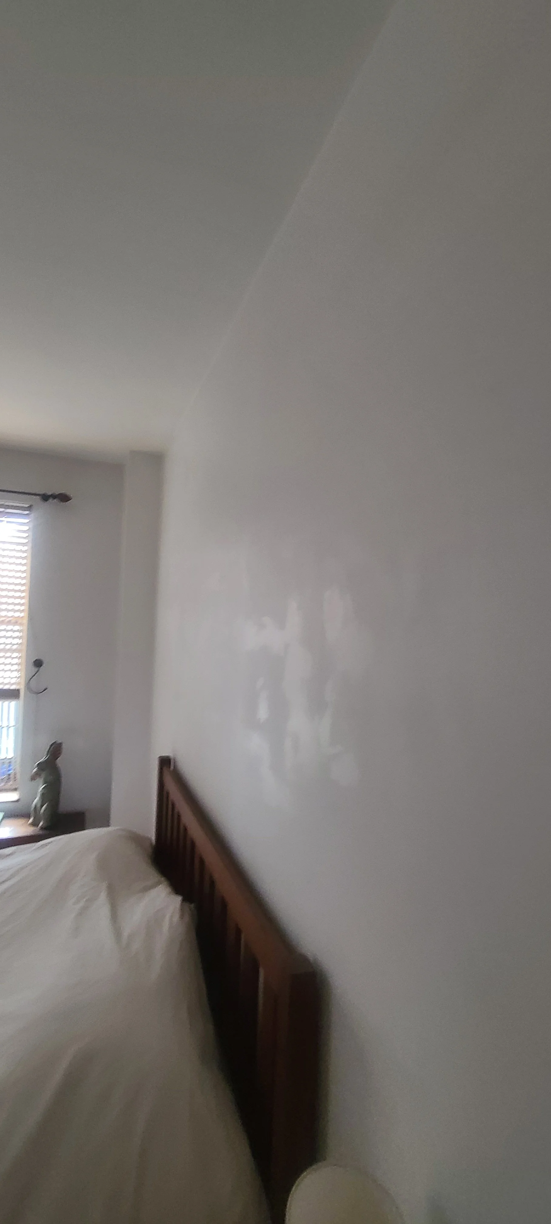 White room with smudges on the wall