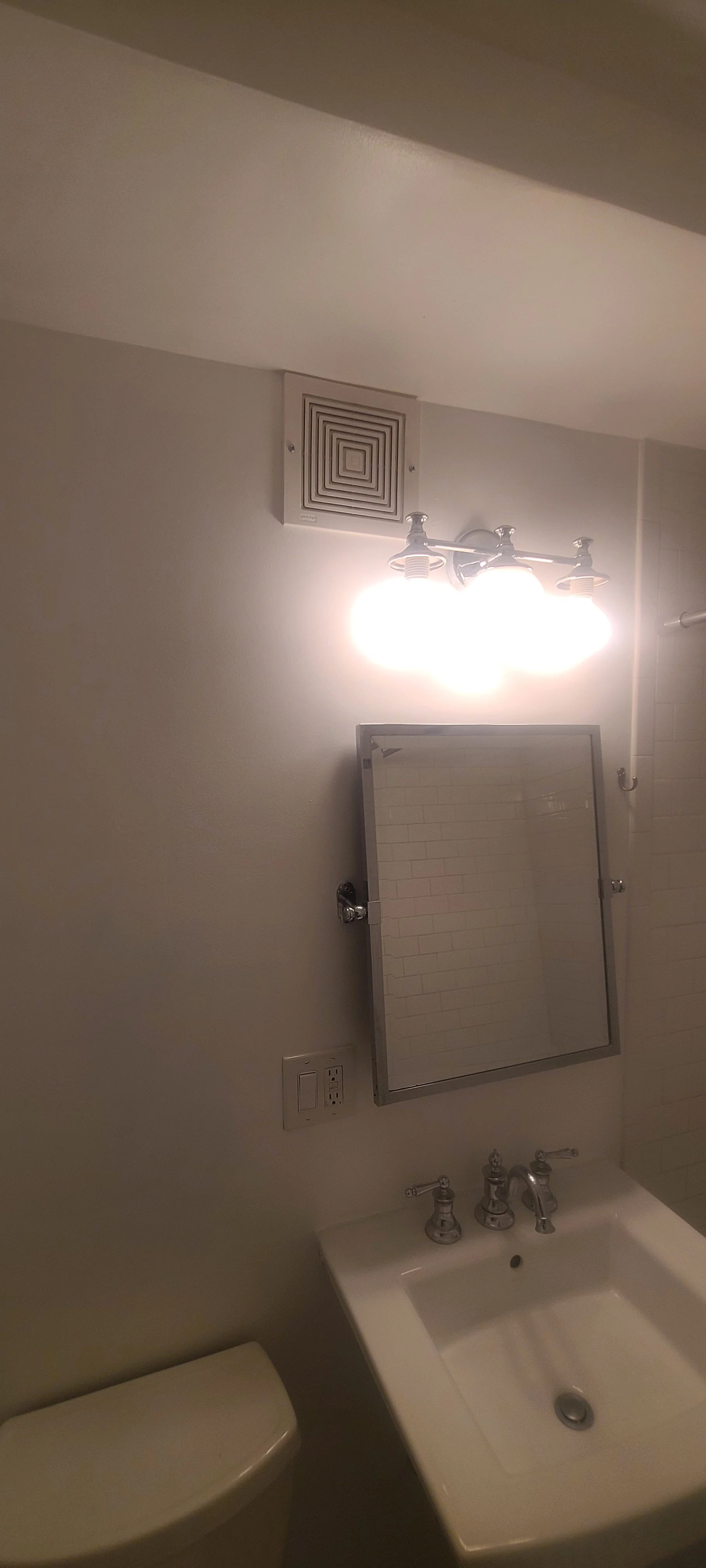 Freshly painted white bathroom