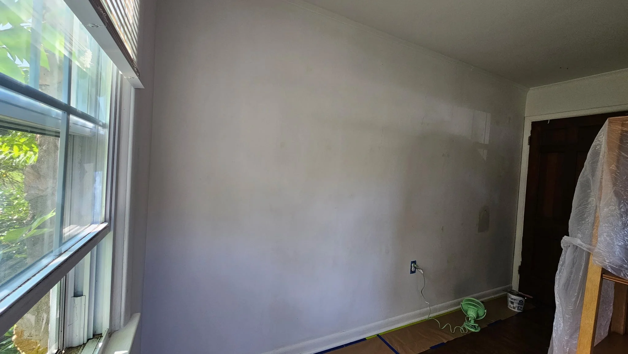 Before photo of a white wall
