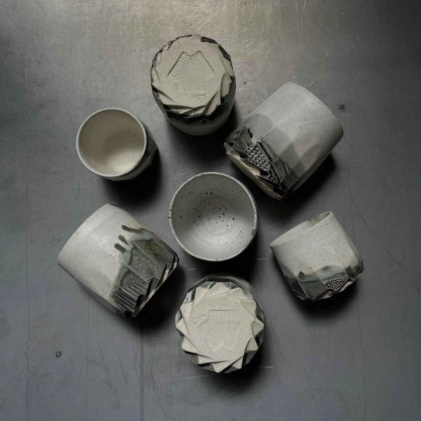 &hellip;36 cups in total, 3 different colourways&hellip; 

#australianceramics #stonewarecups #ceramicgift #carvedclay