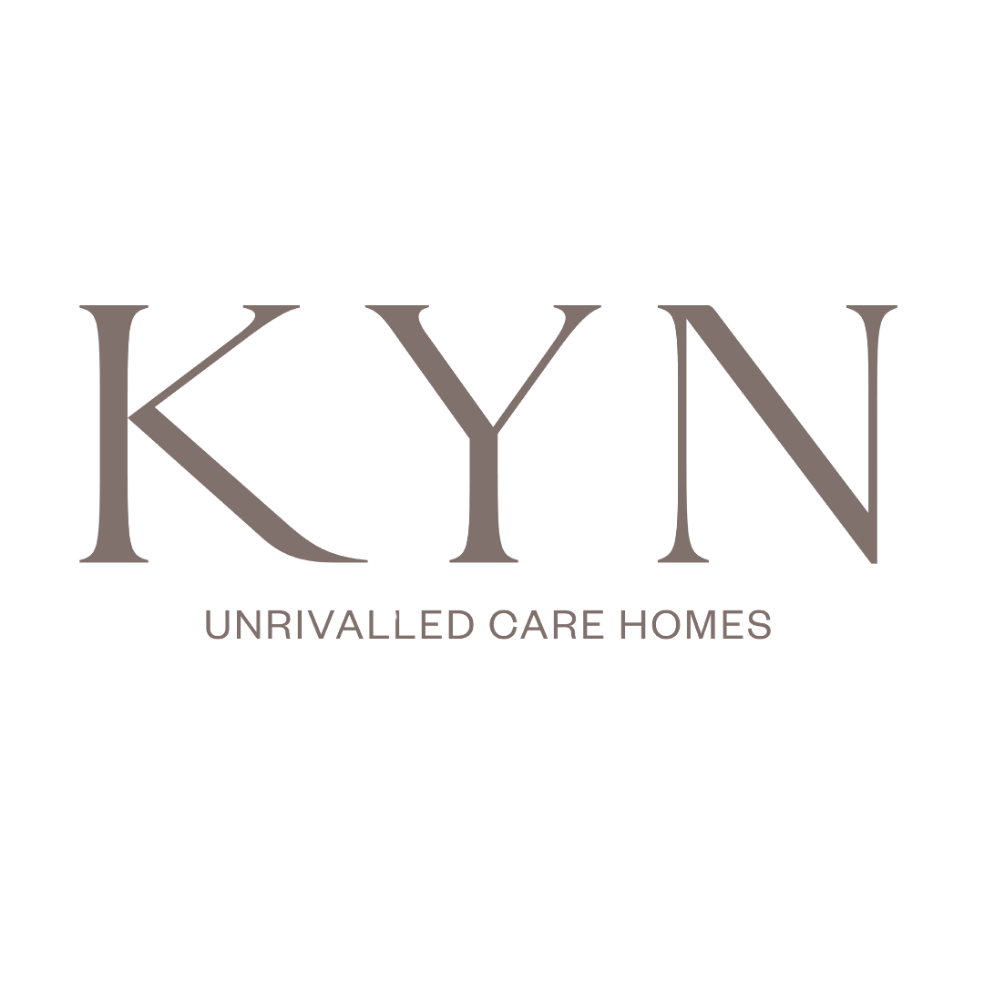 KyN Unrivalled Care Homes logo with large stylized letters 'KY' and 'N' above the words 'UNRIVALLED CARE HOMES' in smaller font.