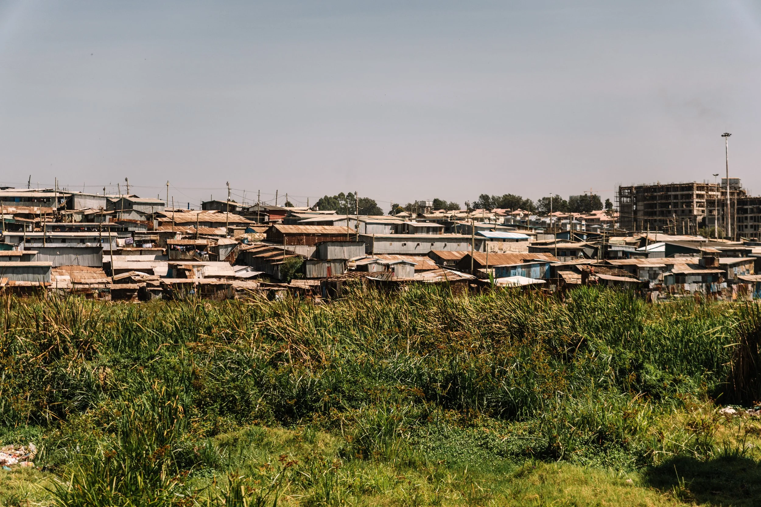 Nairobi-Kibera-biggest-slum-in-Africa.-Slums-in-Nairobi,-Kenya.-2148127878_6000x4000.jpeg