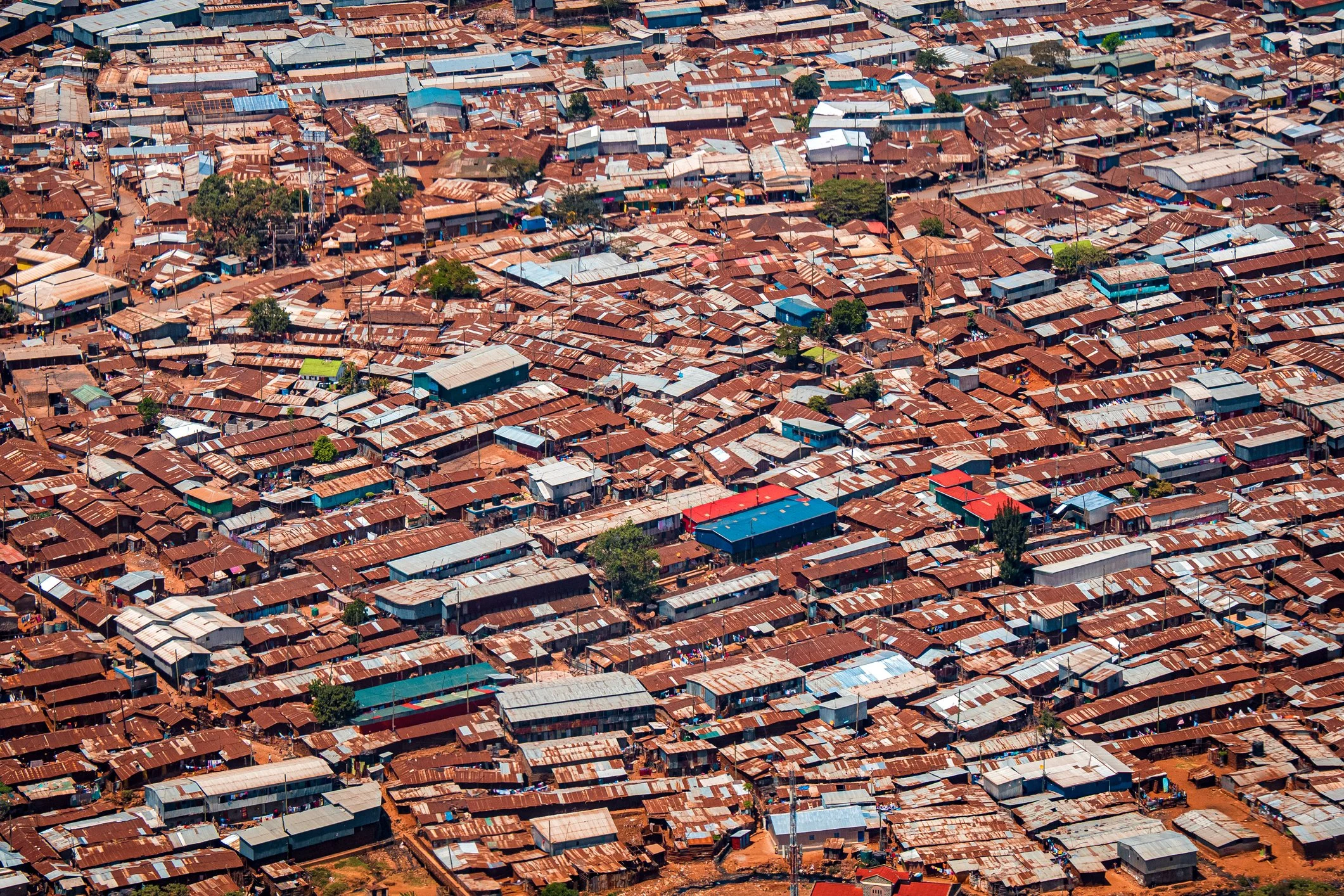 Nairobi-Aerial-view-of-corrugated-iron-huts-at-the-Nairobi-downtown-Kibera-slum-neighborhood,-Nairobi,-Kenya,-East-Africaa-1433299892_2125x1416.jpeg
