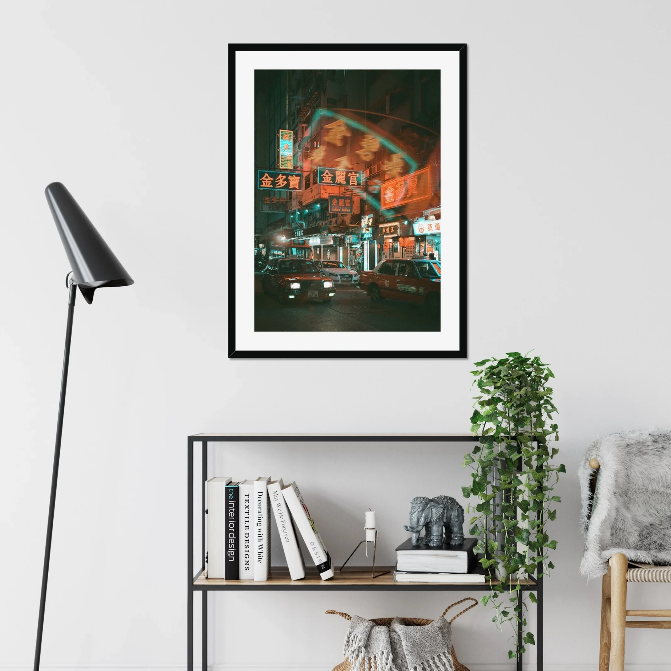 Professional night photography of a red taxi driving through Mong Kok, Hong Kong, with vibrant neon signs and reflections on the wet street.