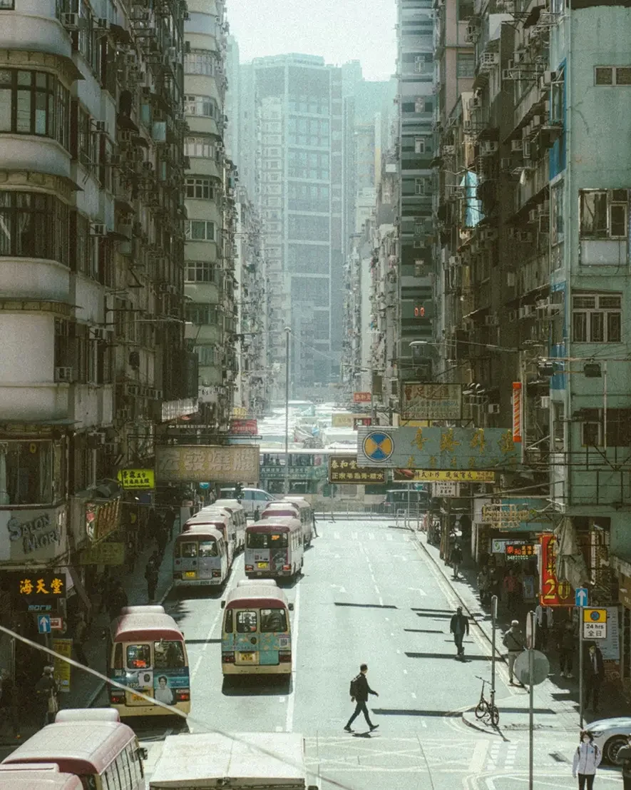 efore and after Lomography X-Pro preset on a red classic car in Madrid, showing vintage cross-processed film colors and high contrast.