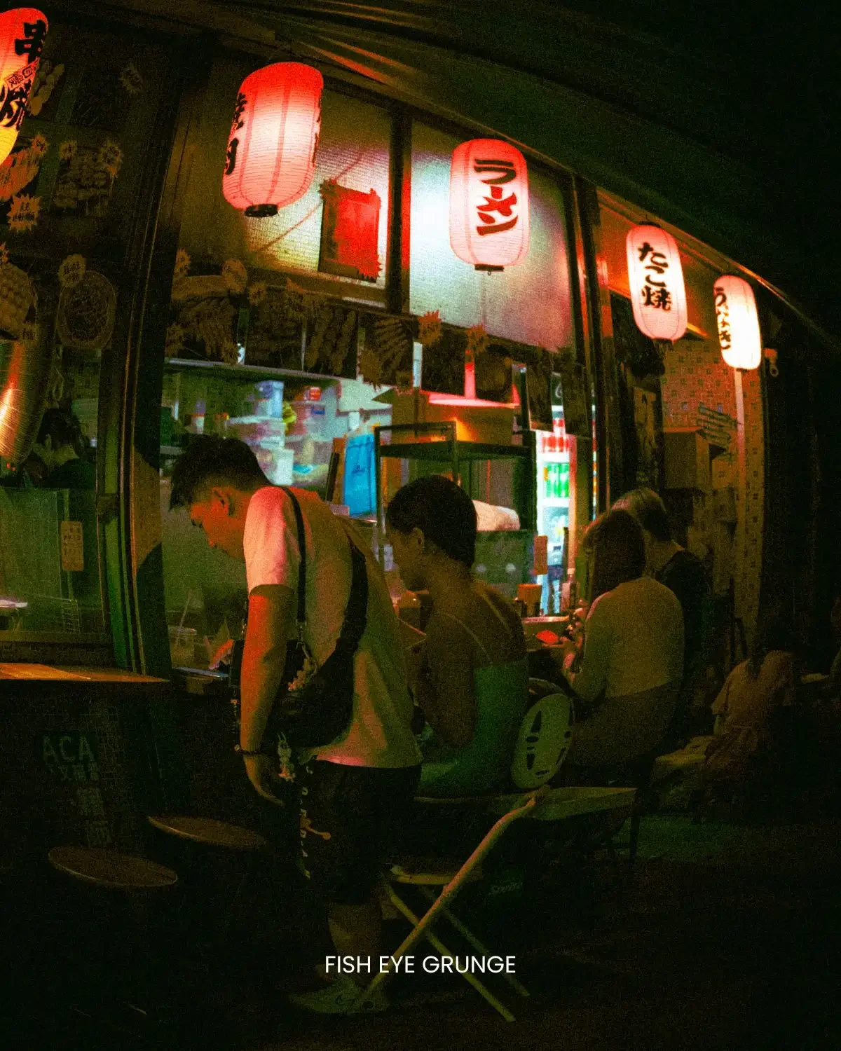 Neon Grunge preset on izakaya-style street food stall at night, warm tungsten light against green ambient tones