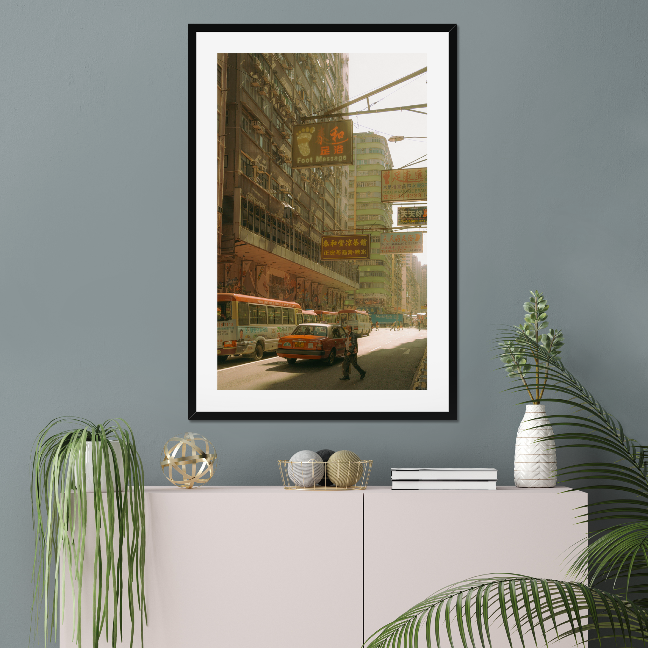 Sun-drenched Hong Kong street photography fine art print. Cinematic urban scene with vintage signs, a red taxi, and a solitary pedestrian crossing. Warm wall art decor.
