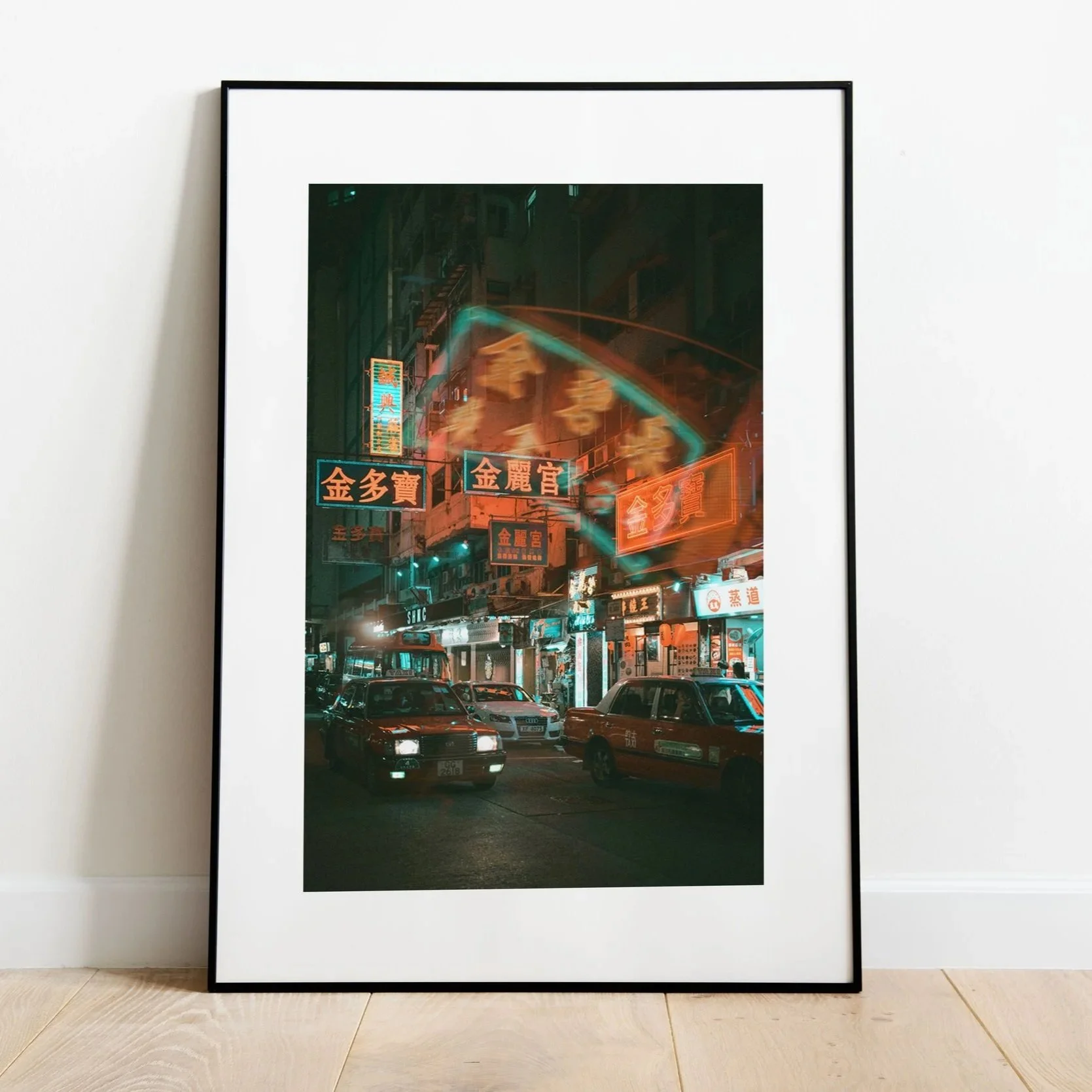 Professional night photography of a red taxi driving through Mong Kok, Hong Kong, with vibrant neon signs and reflections on the wet street.