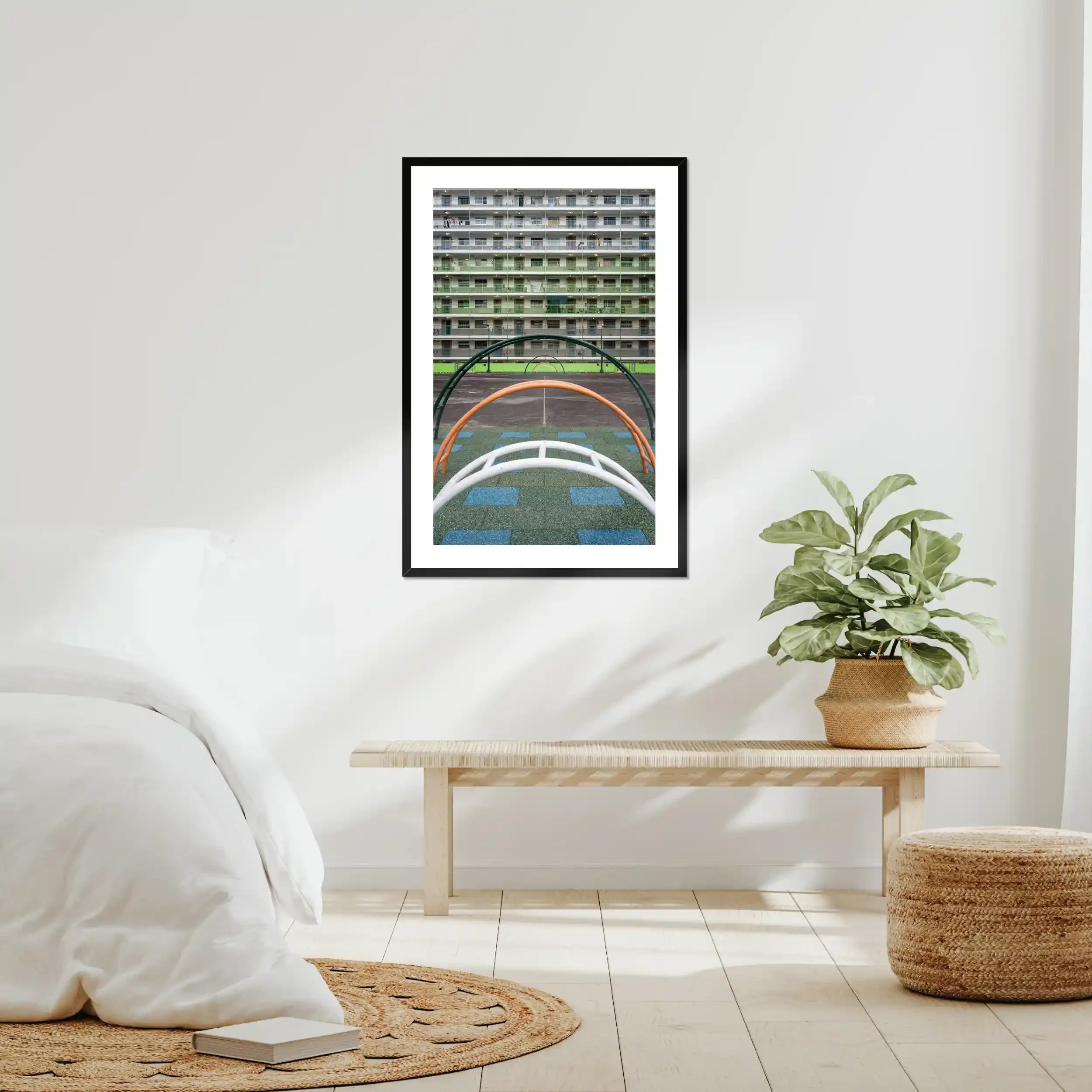Symmetrical photography of the green residential buildings and the colorful courtyard playground at Nam Shan Estate in Hong Kong.
