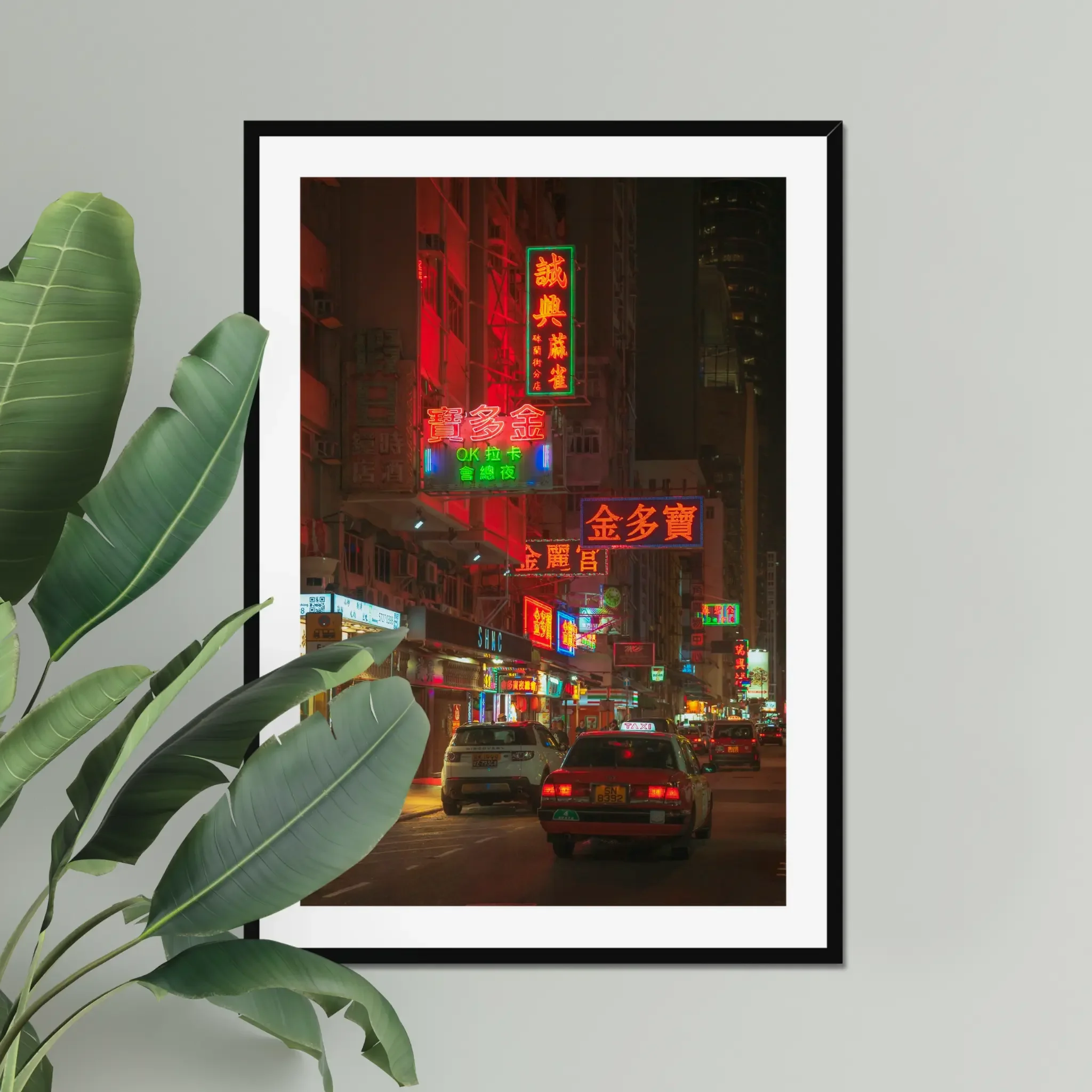 Mong Kok street photography print showing neon signage and a solitary figure at night in Hong Kong