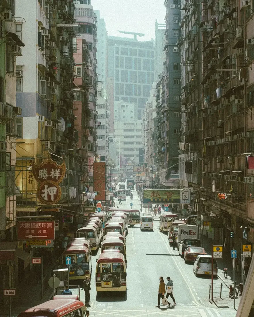 efore and after Lomography X-Pro preset on a red classic car in Madrid, showing vintage cross-processed film colors and high contrast.
