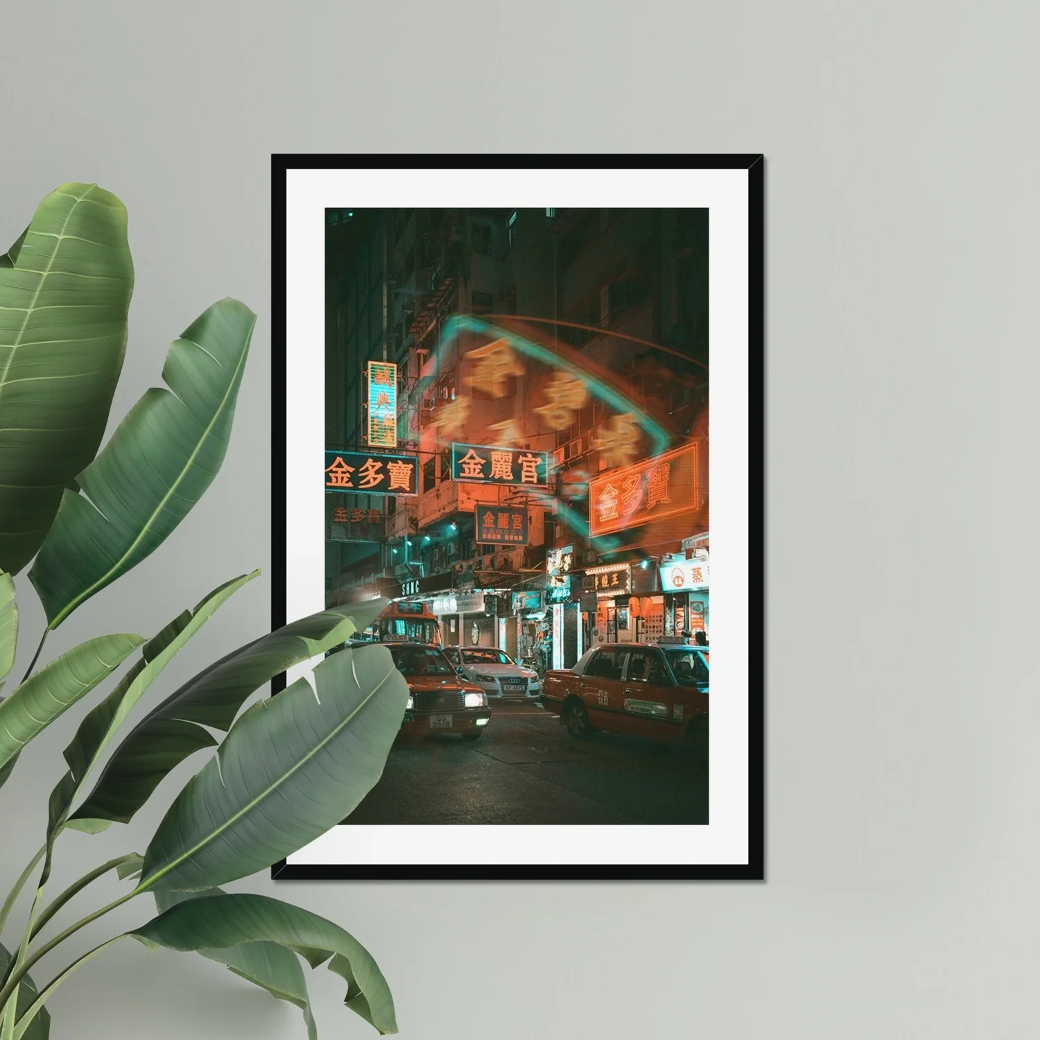 Professional night photography of a red taxi driving through Mong Kok, Hong Kong, with vibrant neon signs and reflections on the wet street.
